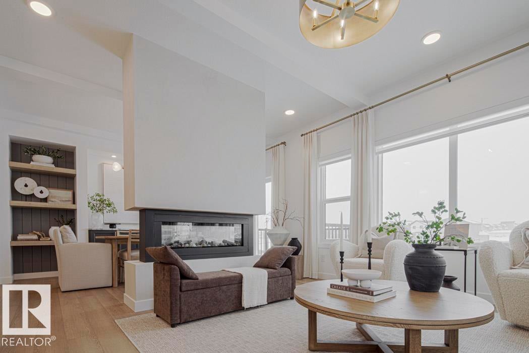 4551 Warbler Loop, Edmonton, AB - Indoor Photo Showing Living Room With Fireplace