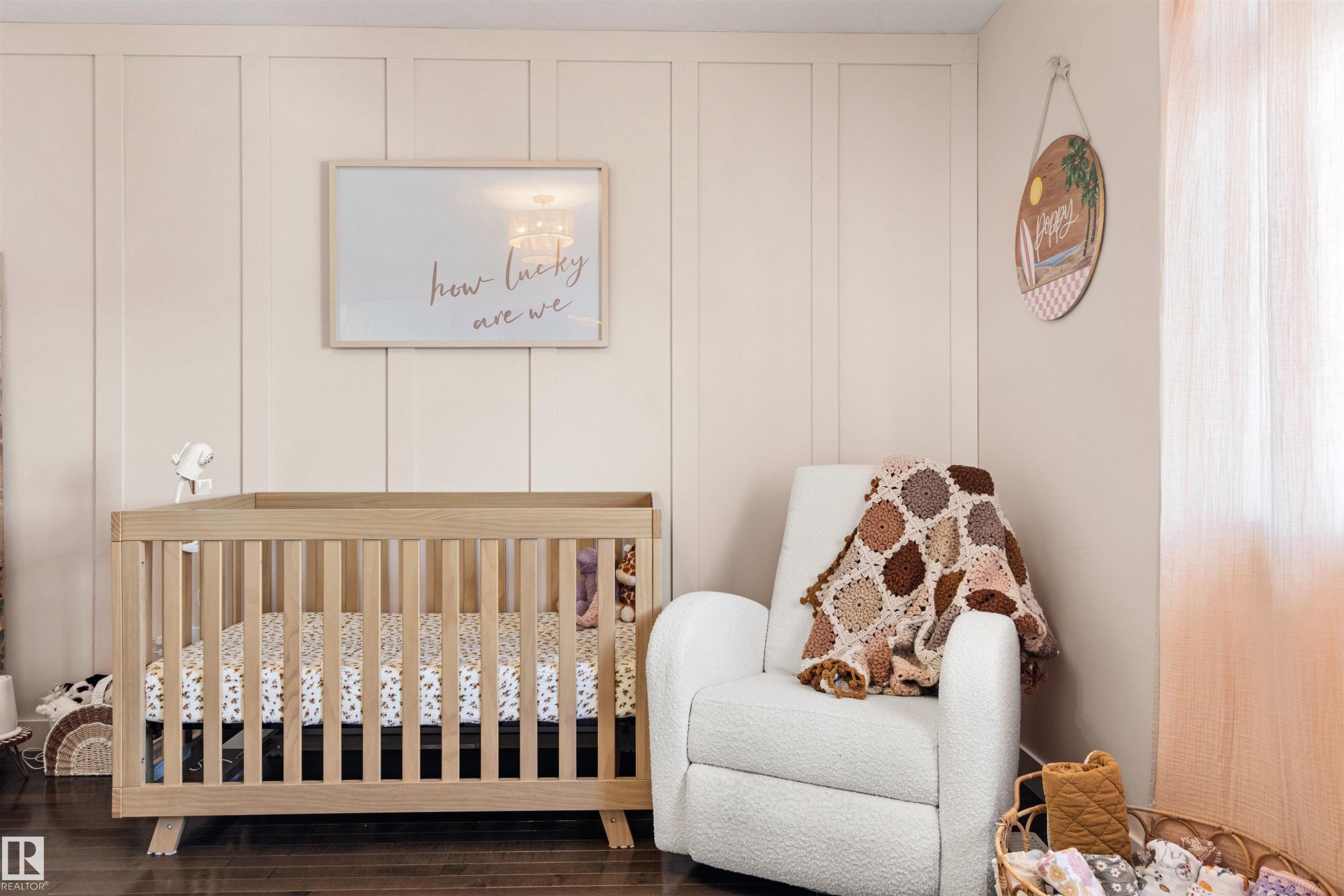 This room features wainscoting paneling on the walls, providing a refined aesthetic - 38 Hewitt Circle, Spruce Grove, AB - Indoor Photo Showing Bedroom