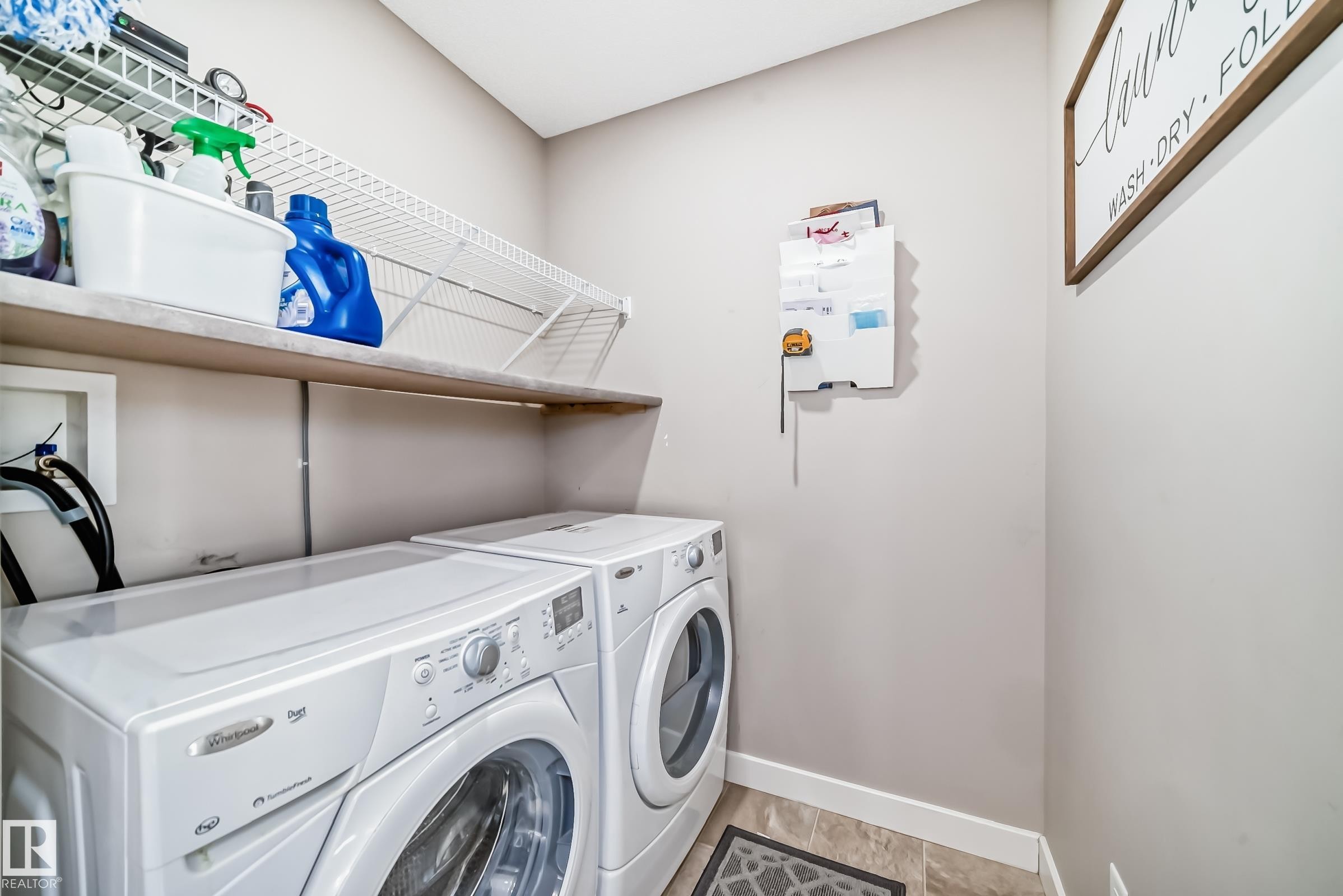 5920 Rue Eaglemont, Beaumont, AB - Indoor Photo Showing Laundry Room