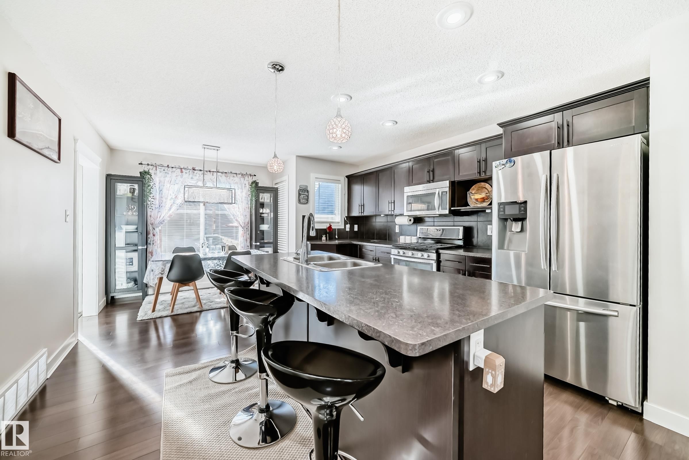 5920 Rue Eaglemont, Beaumont, AB - Indoor Photo Showing Kitchen With Stainless Steel Kitchen With Double Sink With Upgraded Kitchen
