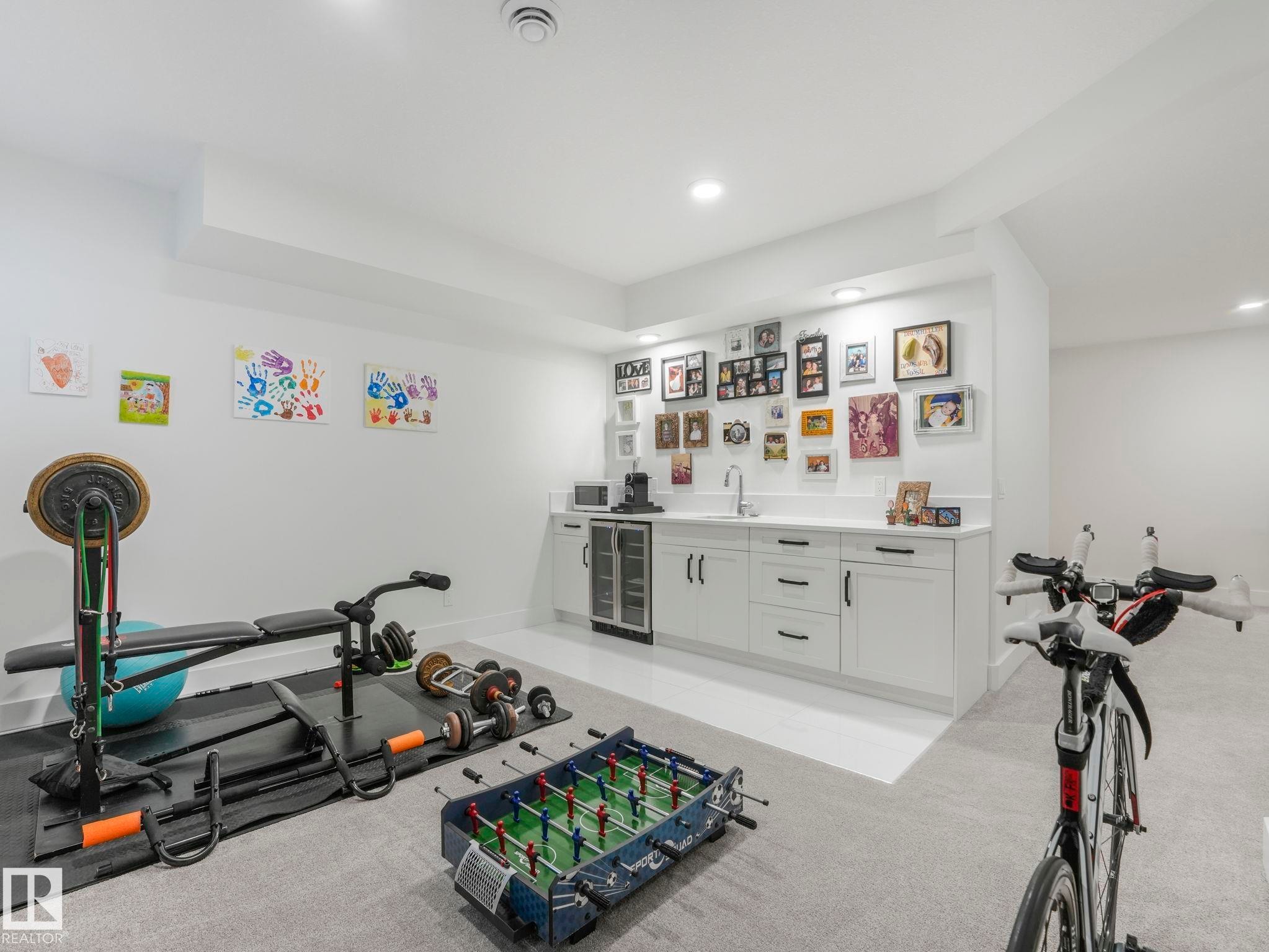 7215 May Road, Edmonton, AB - Indoor Photo Showing Gym Room