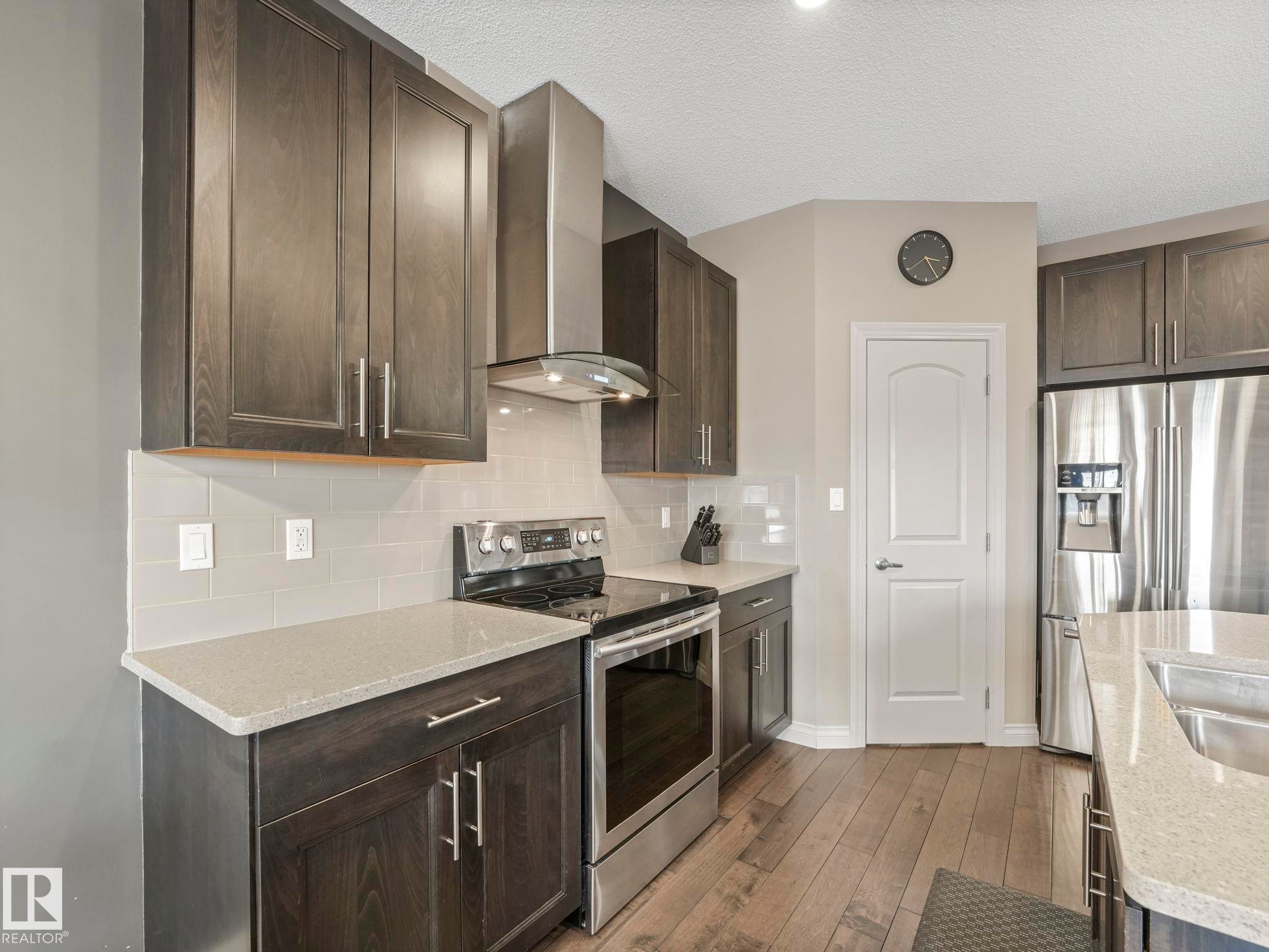 16412 12 Avenue, Edmonton, AB - Indoor Photo Showing Kitchen With Double Sink