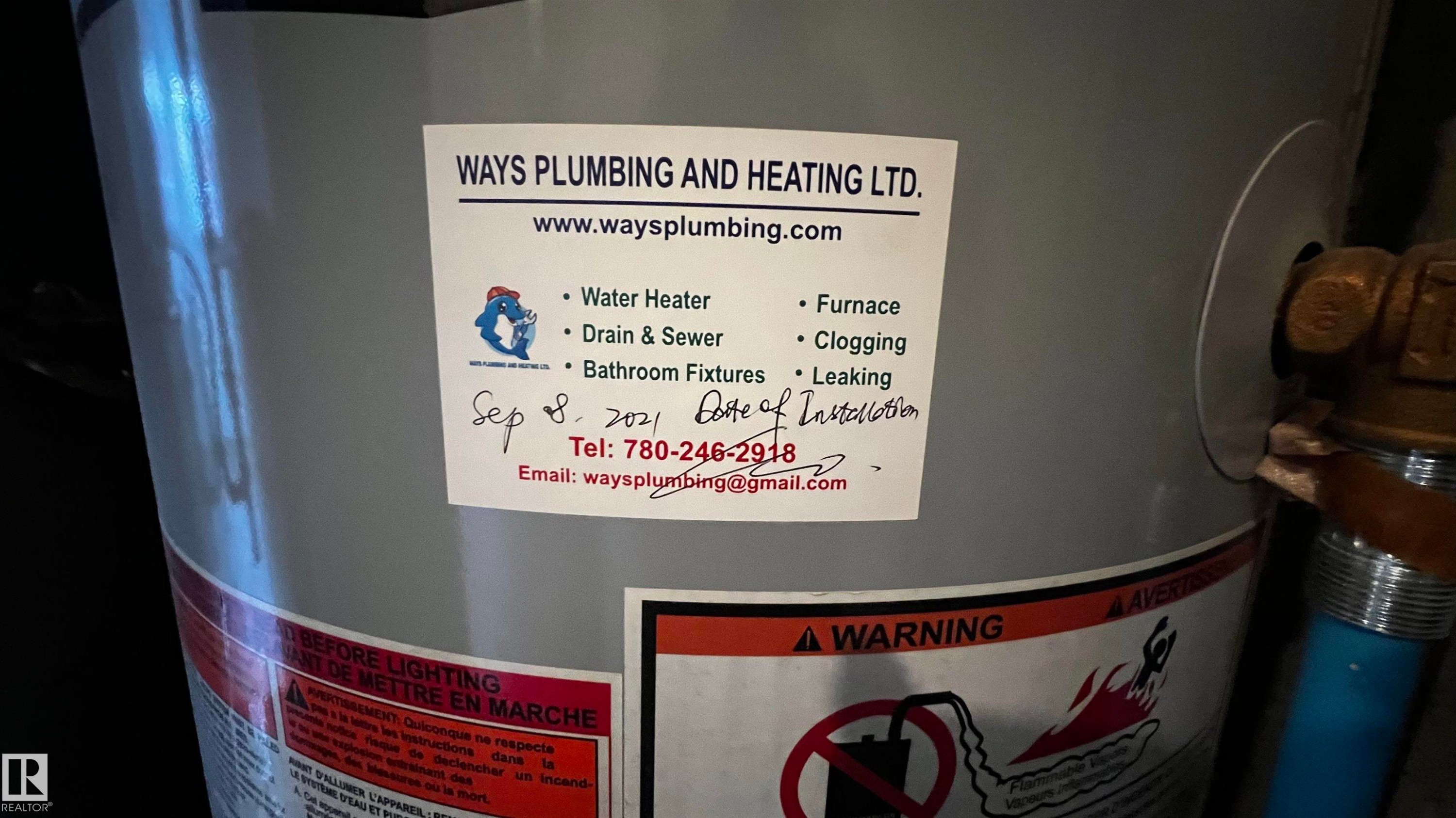 The property includes a water heater with a visible installation date of September 8, 2021 - 3323 107 Avenue Nw, Edmonton, AB - Indoor Photo Showing Basement