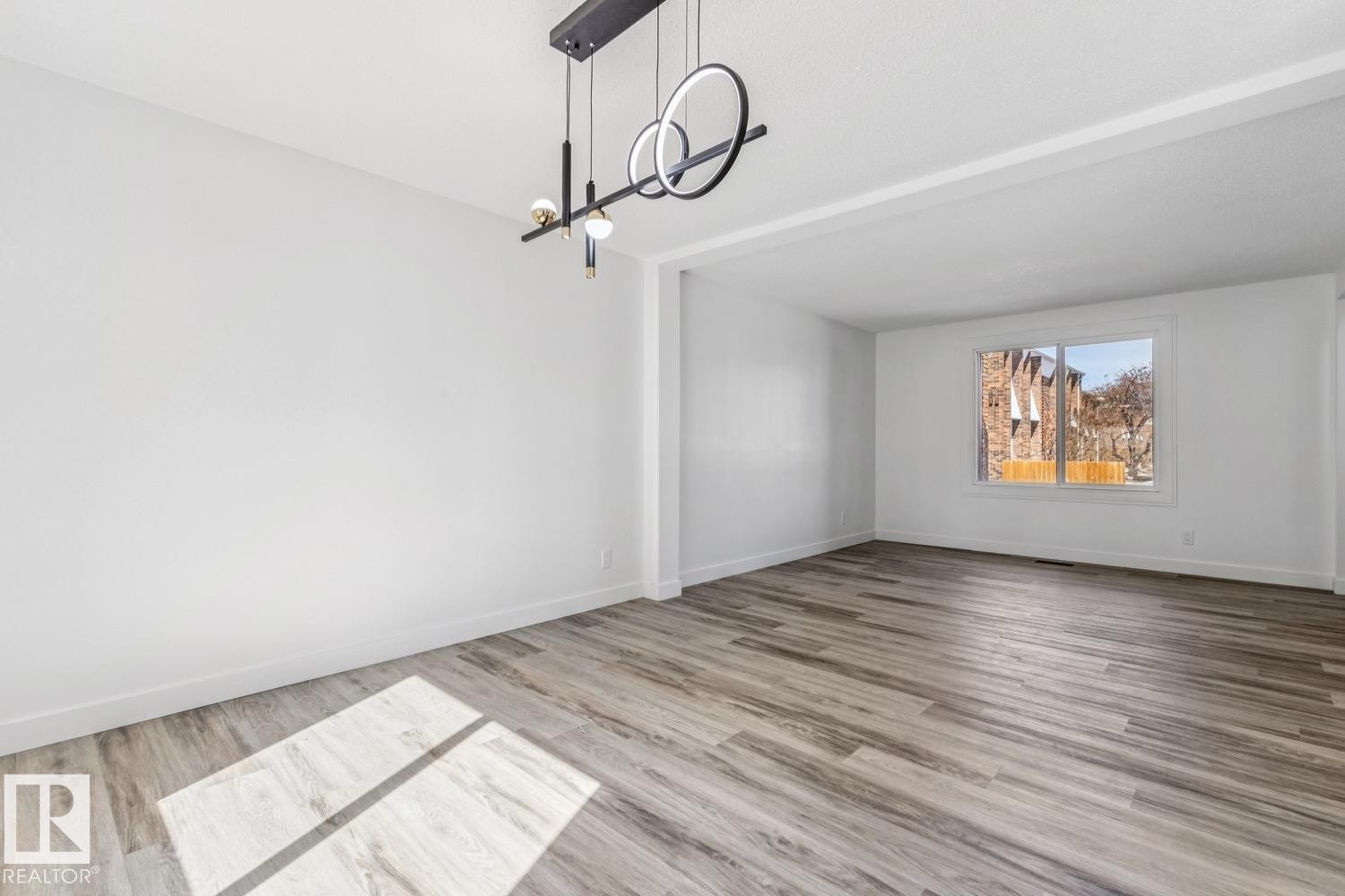 The property features light-colored walls and modern plank flooring throughout - 95 Ridgewood Terrace, St. Albert, AB - Indoor