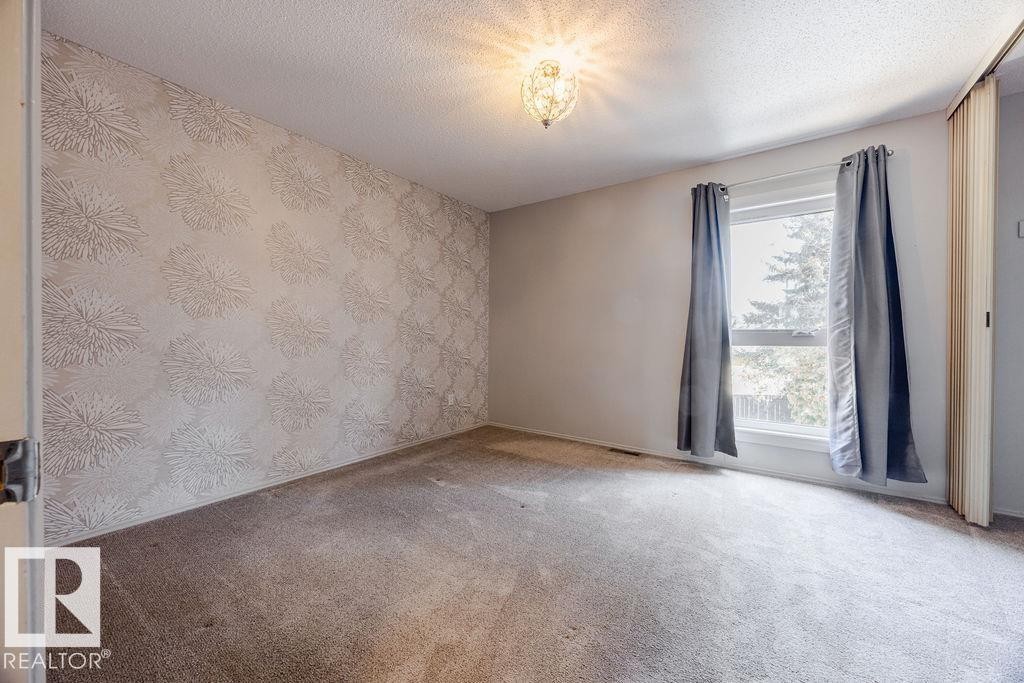 There are newer triple pane windows throughout the home keeping the cold out in Winter and the hot out in Summer. - 12032 25 Avenue, Edmonton, AB - Indoor Photo Showing Other Room