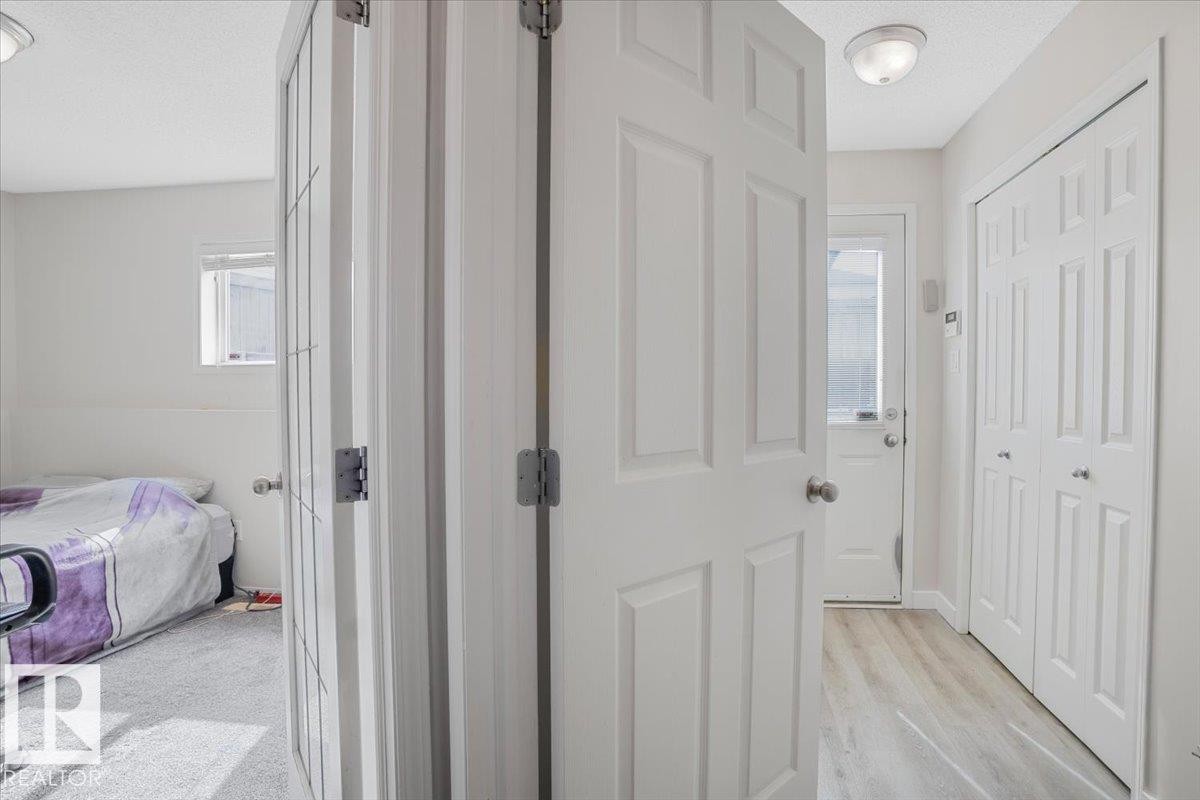 The property features light-colored walls and doors throughout - 3119 32 Avenue, Edmonton, AB - Indoor