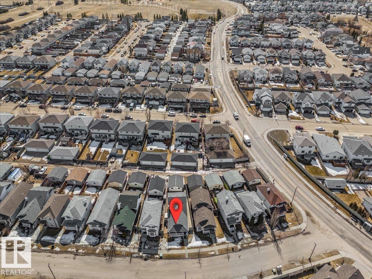 Aerial view of the property and the surrounding neighborhood, featuring residential streets and numerous detached homes - 3119 32 Avenue, Edmonton, AB - Outdoor With View