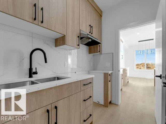8512 Mayday Run Run, Edmonton, AB - Indoor Photo Showing Kitchen With Double Sink With Upgraded Kitchen