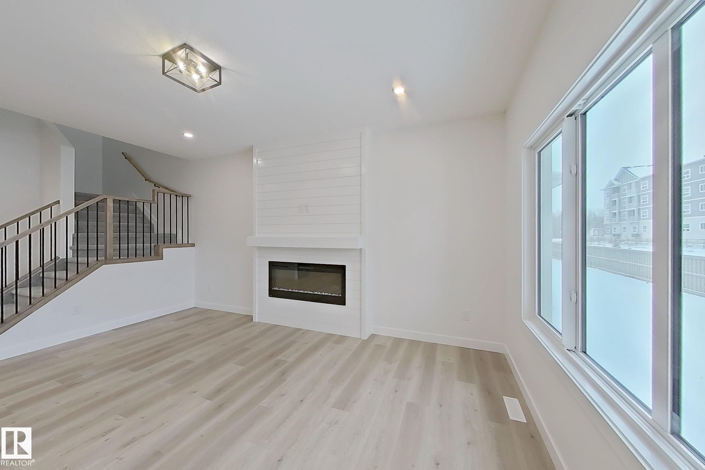 3158 Magpie Way, Edmonton, AB - Indoor With Fireplace