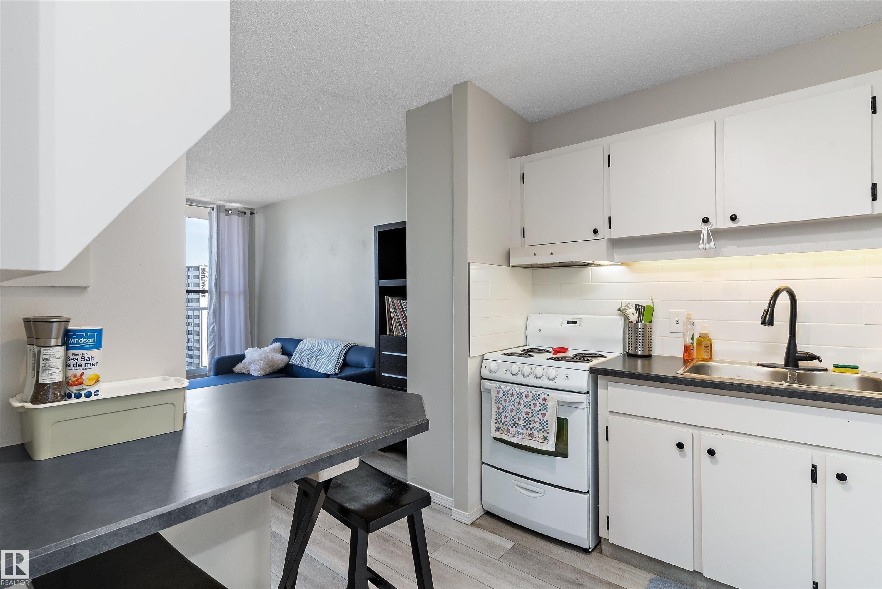 1002 12121 Jasper Avenue, Edmonton, AB - Indoor Photo Showing Kitchen With Double Sink