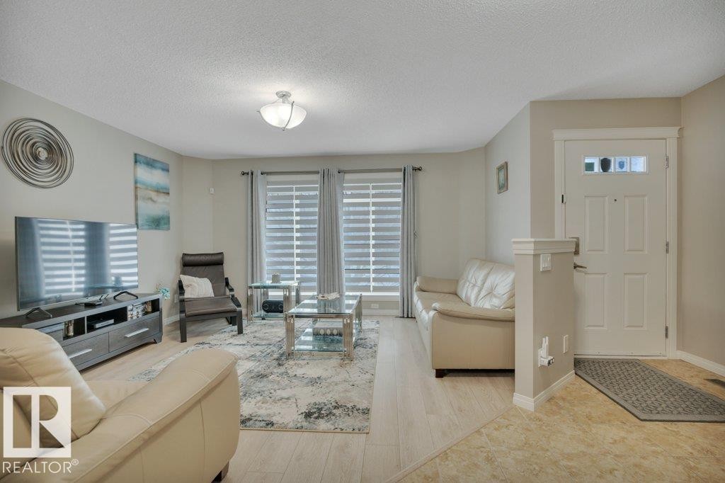 1167 Mcconachie Boulevard, Edmonton, AB - Indoor Photo Showing Living Room