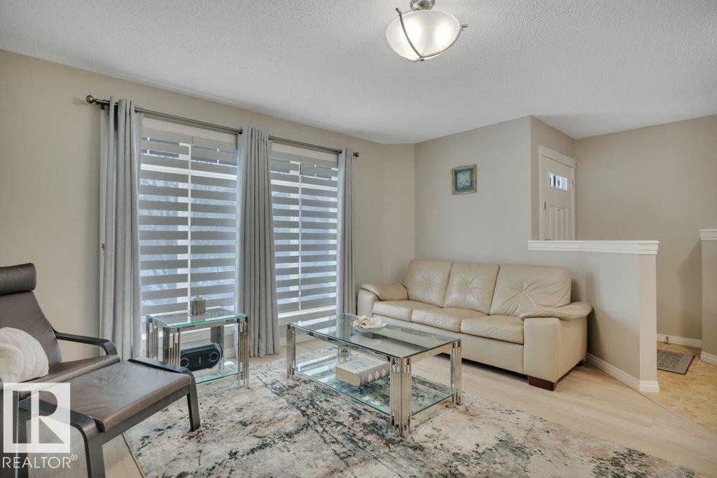 1167 Mcconachie Boulevard, Edmonton, AB - Indoor Photo Showing Living Room