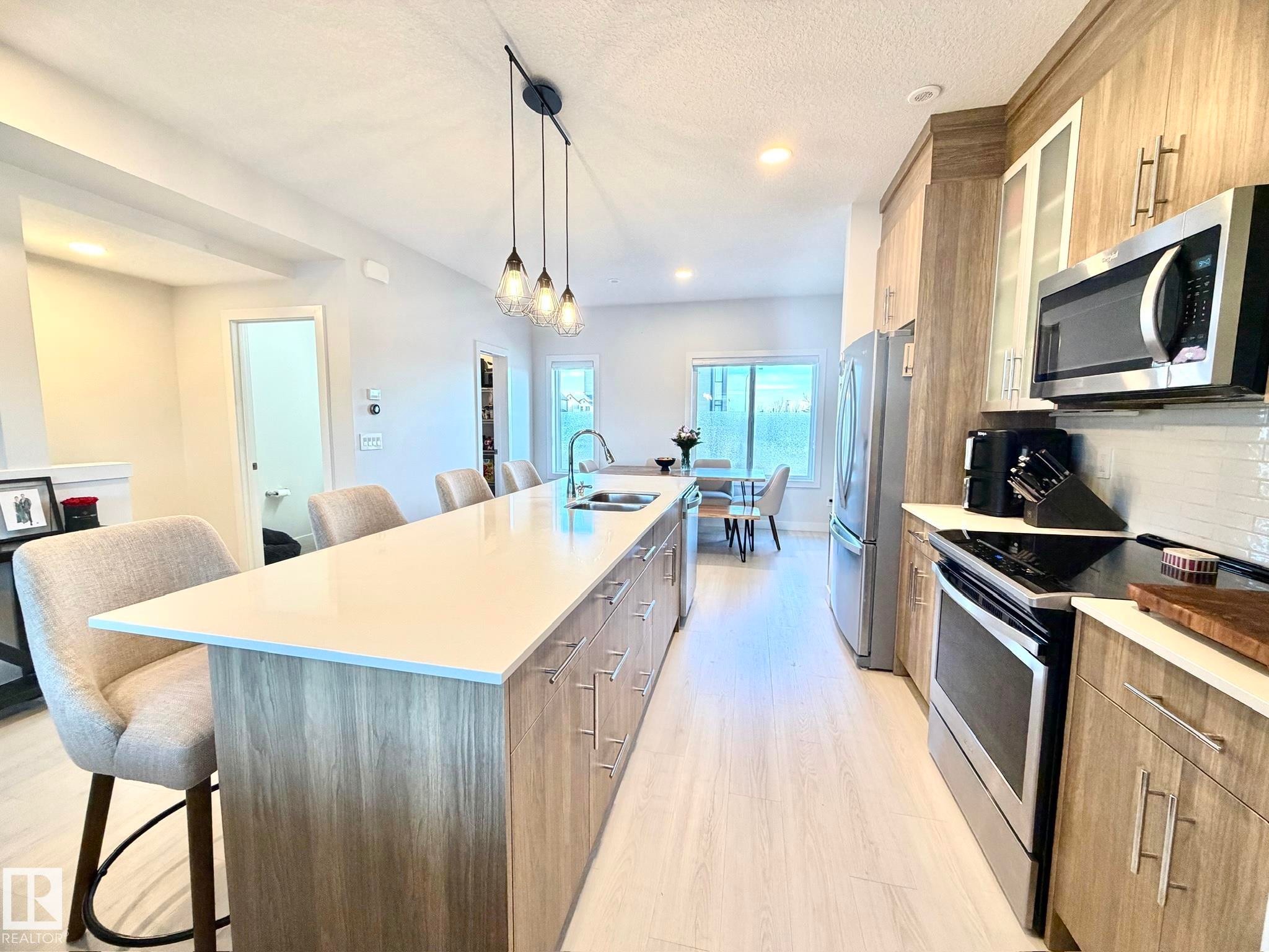 2 1010 Rabbit Hill Road, Edmonton, AB - Indoor Photo Showing Kitchen With Double Sink