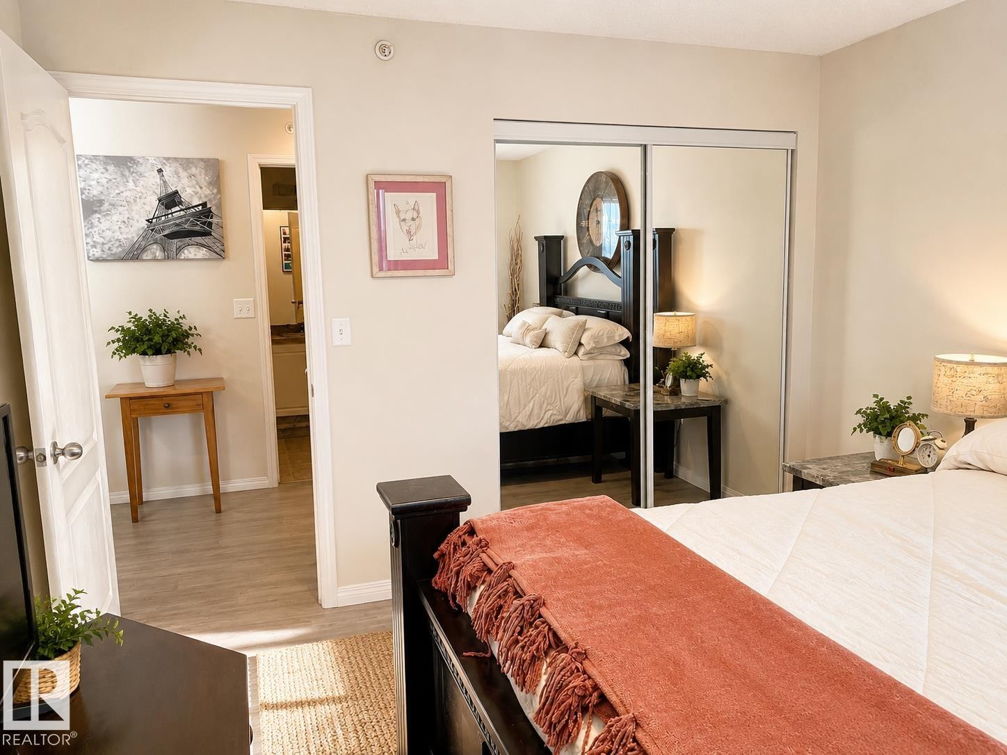 Bedroom featuring light-toned walls and wood-finish flooring - 336 9525 162 Avenue, Edmonton, AB - Indoor Photo Showing Bedroom