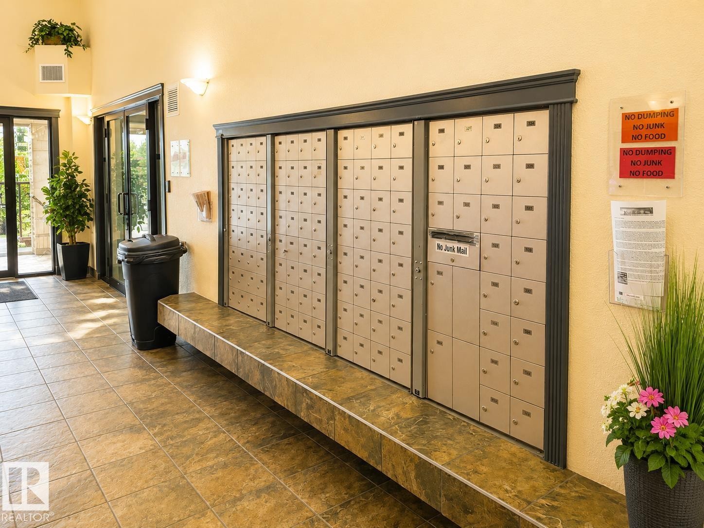 Secure mailboxes with a mail slot for "No Junk Mail" are featured in this entryway - 336 9525 162 Avenue, Edmonton, AB - Indoor Photo Showing Other Room