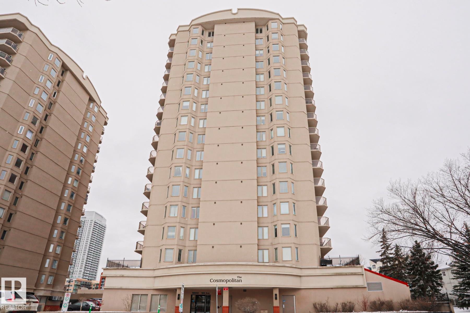 The property is a high-rise building featuring a light-colored facade, numerous windows, and private balconies on each level - 201 10909 103 Avenue Nw, Edmonton, AB - Outdoor