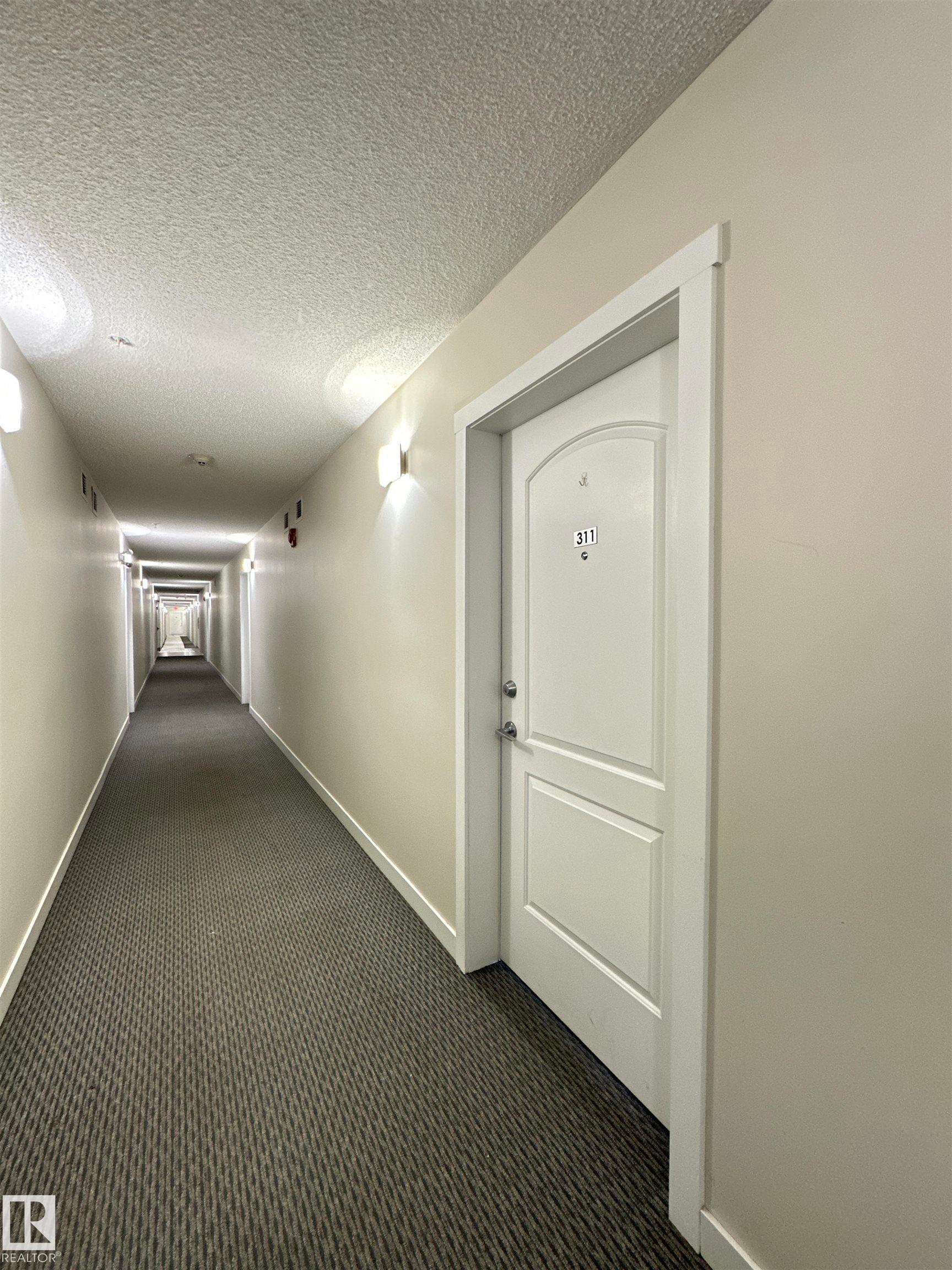 311 667 Watt Boulevard, Edmonton, AB - Indoor Photo Showing Other Room