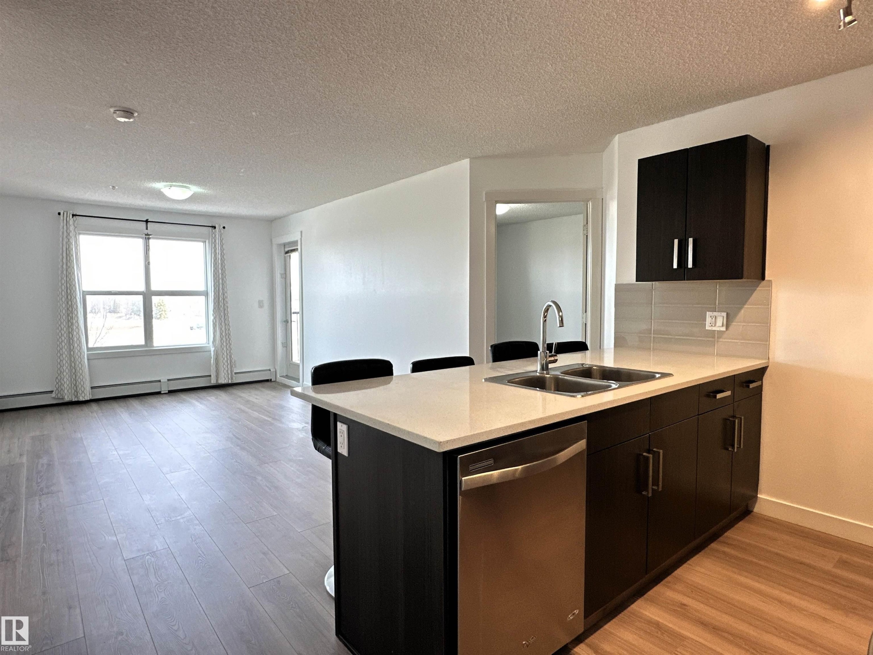 311 667 Watt Boulevard, Edmonton, AB - Indoor Photo Showing Kitchen With Double Sink
