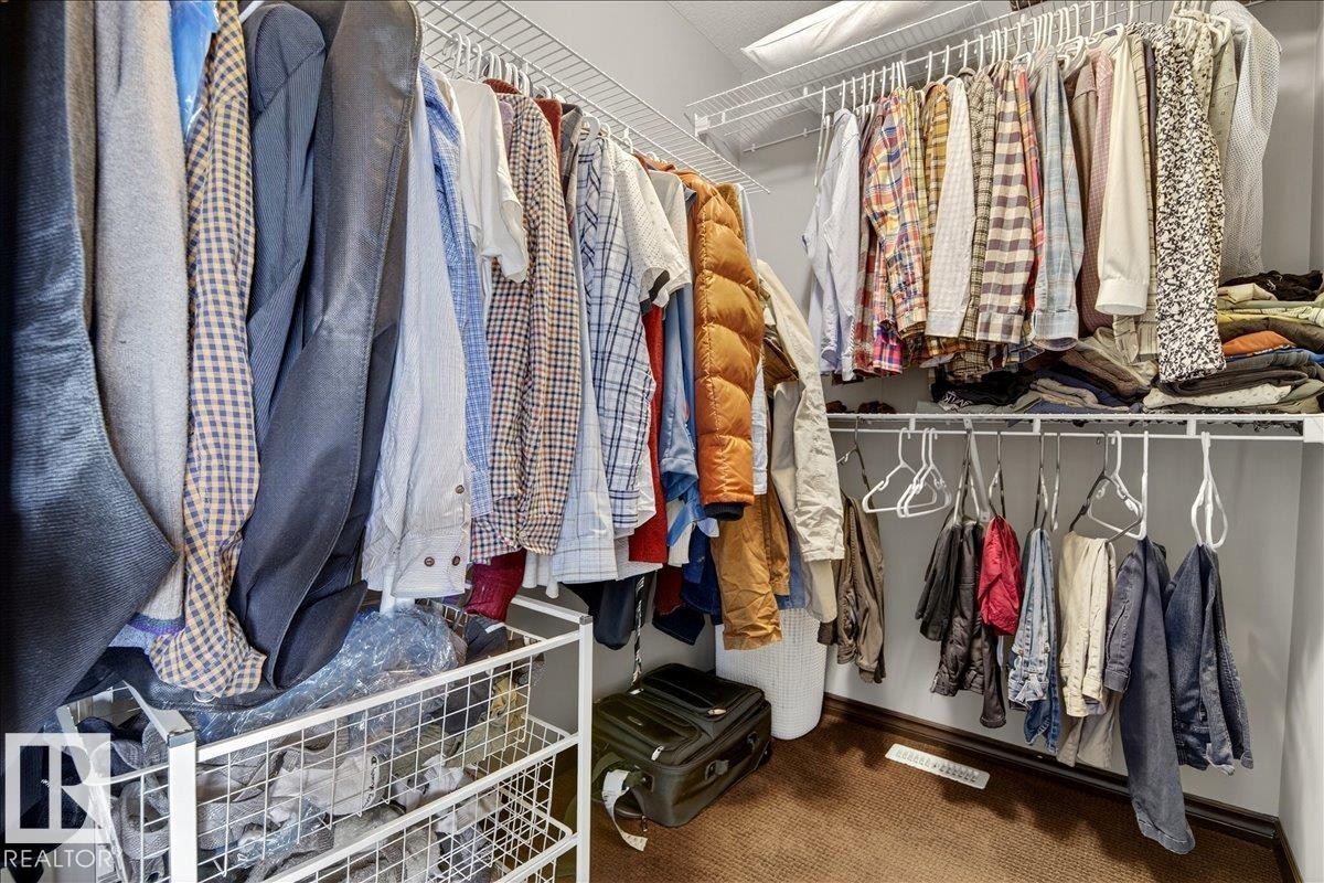 This closet offers extensive wire shelving and hanging rods for storage - 1530 Chapman Way, Edmonton, AB - Indoor With Storage