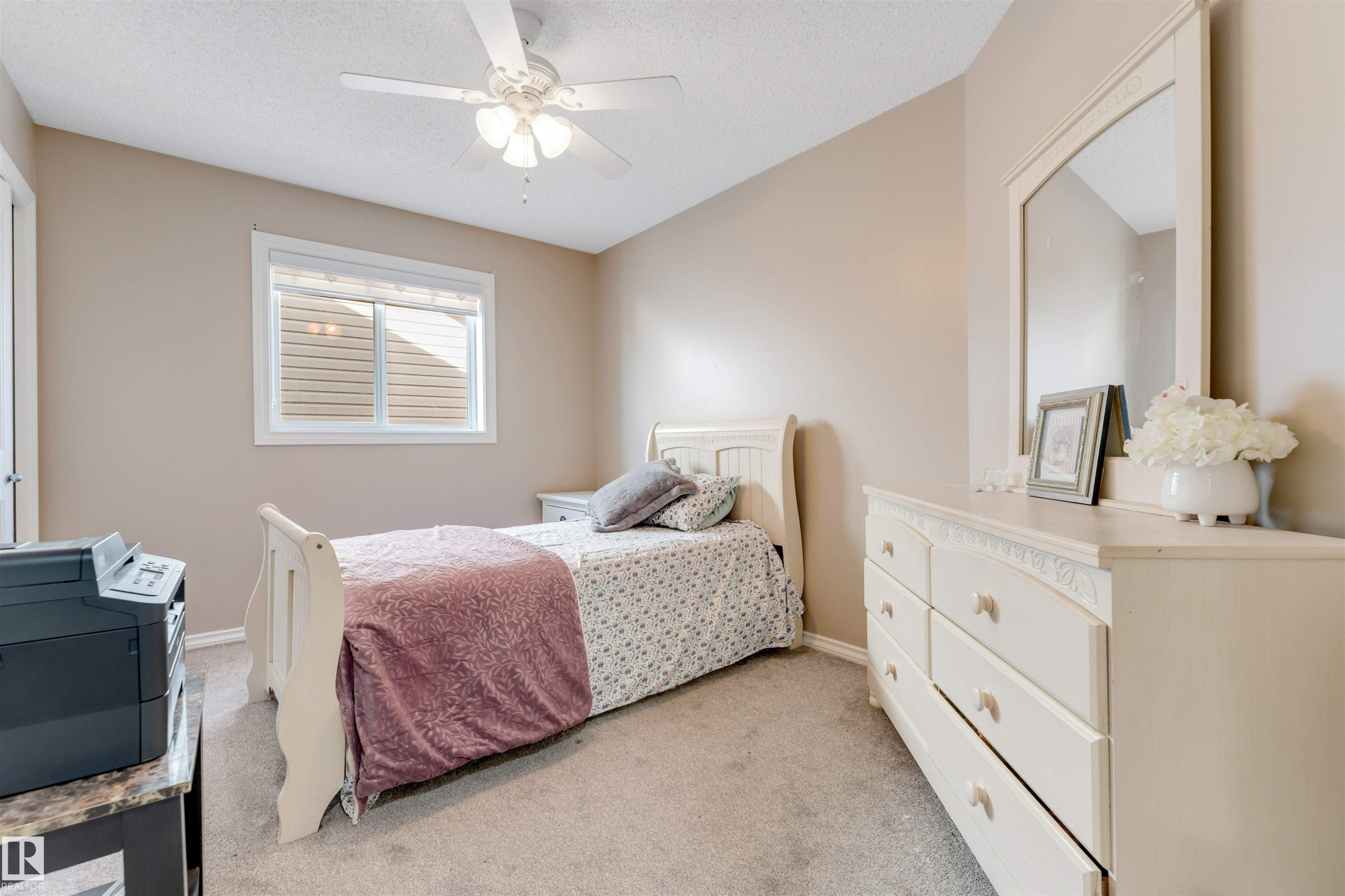 This room features neutral-toned walls and carpeted flooring - 121 64 Street, Edmonton, AB - Indoor Photo Showing Bedroom