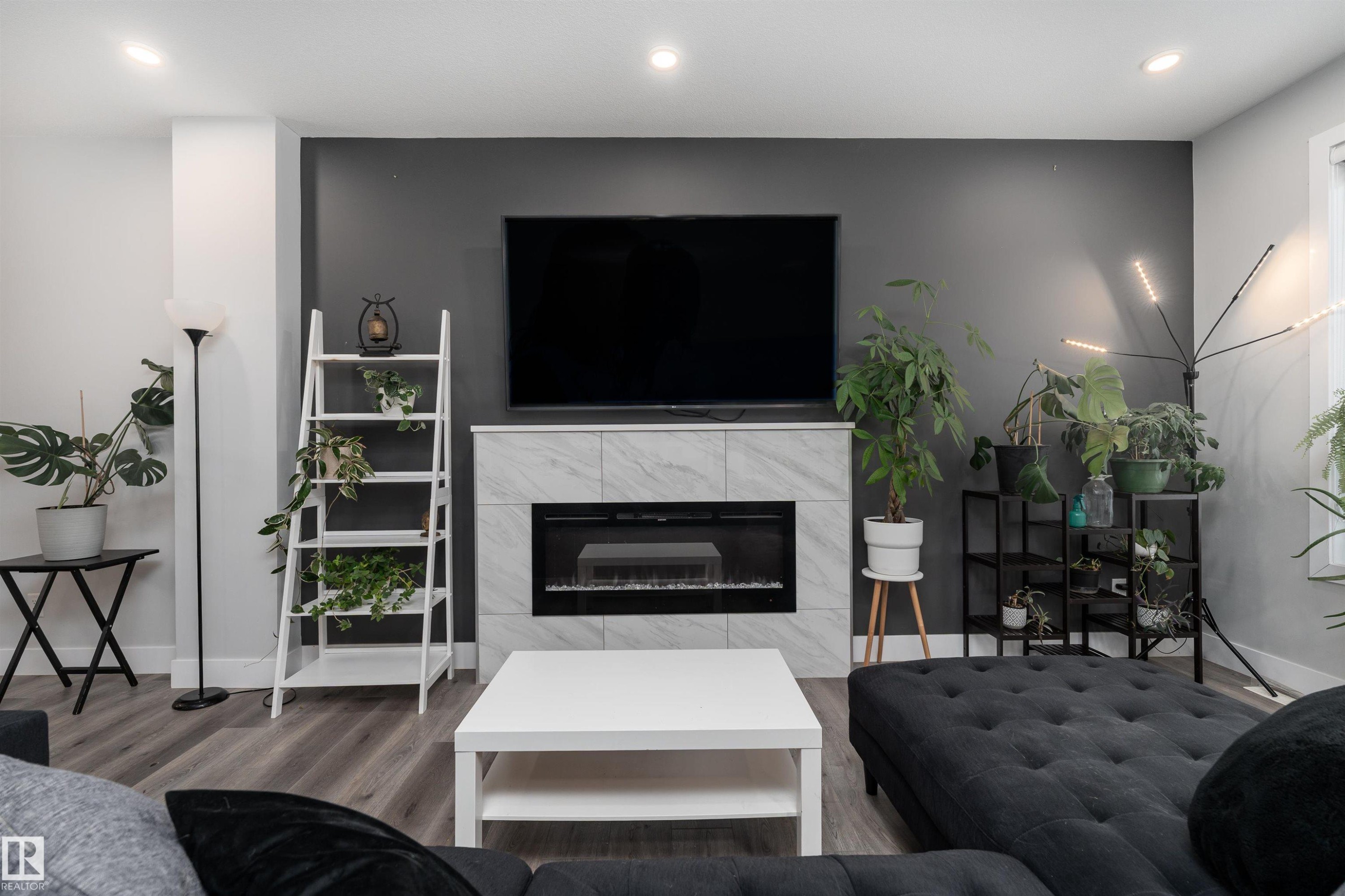 9338 Pear Link, Edmonton, AB - Indoor Photo Showing Living Room With Fireplace