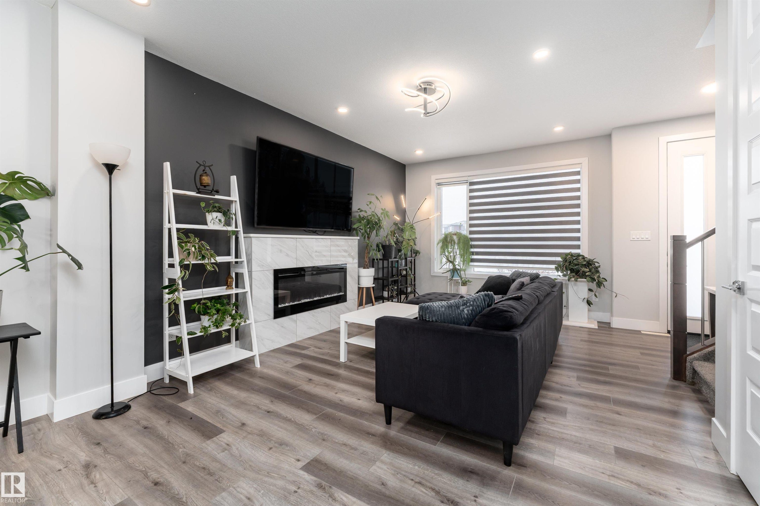 9338 Pear Link, Edmonton, AB - Indoor Photo Showing Living Room With Fireplace