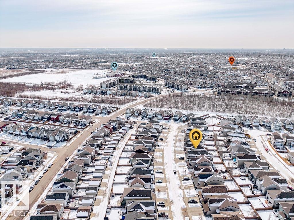 Aerial view of the neighborhood with residential properties and surrounding natural areas - 17534 60A Street, Edmonton, AB - Outdoor With View