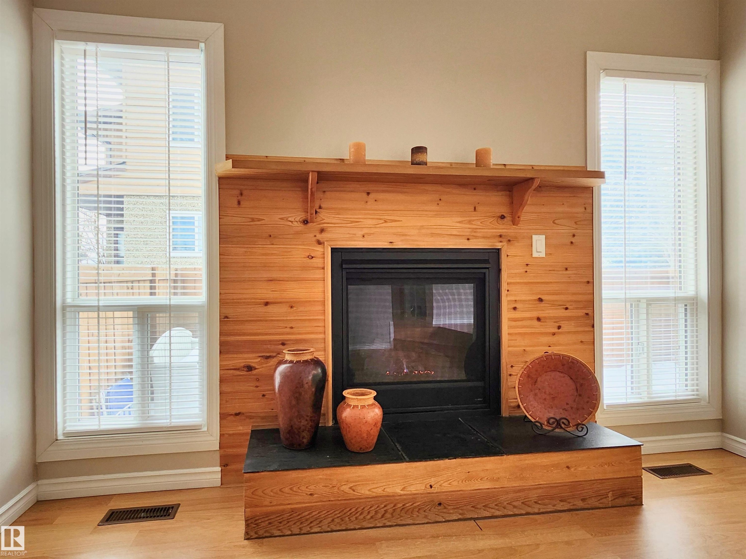69 3812 20 Avenue, Edmonton, AB - Indoor Photo Showing Living Room With Fireplace