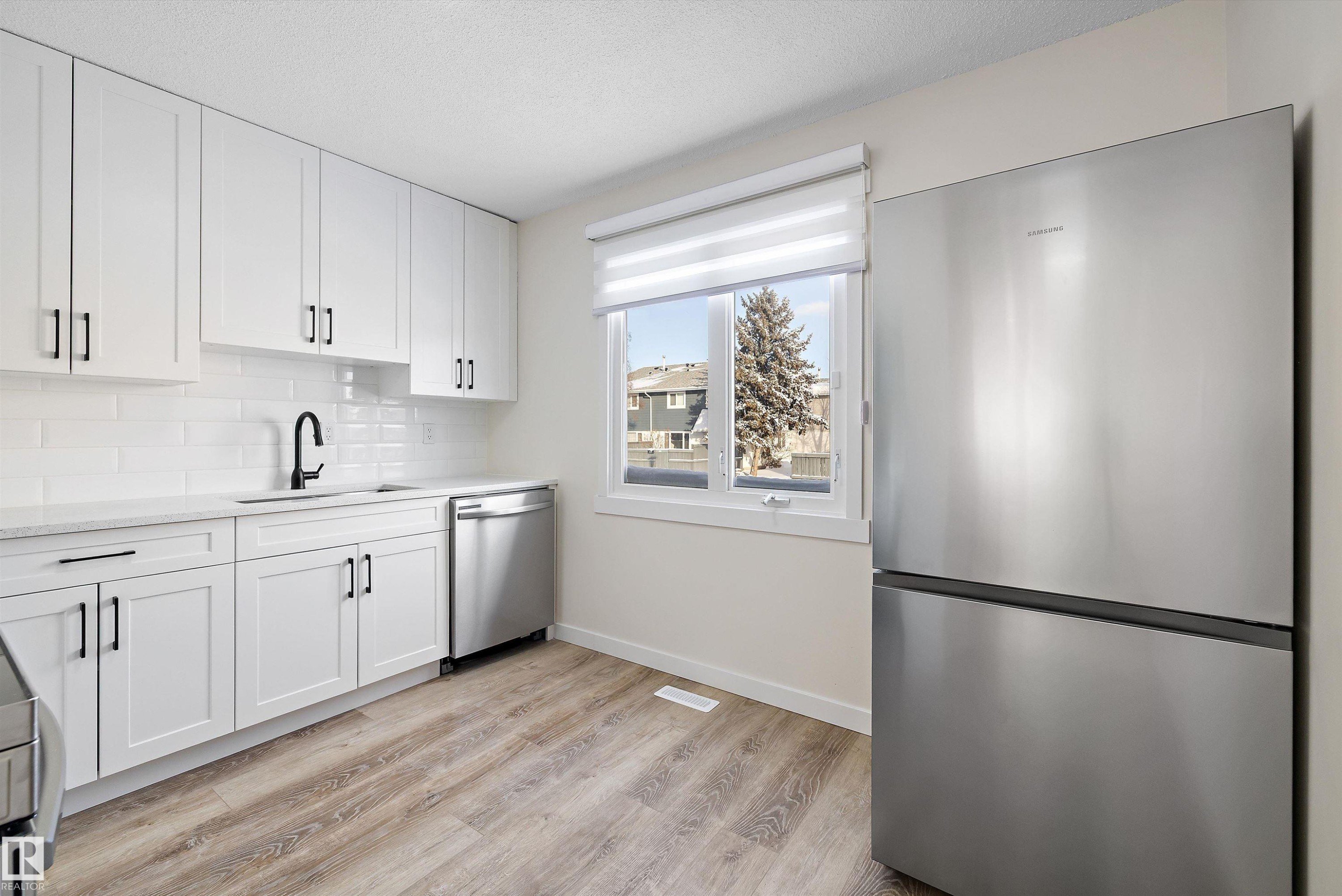 130 Callingwood Two, Edmonton, AB - Indoor Photo Showing Kitchen With Stainless Steel Kitchen