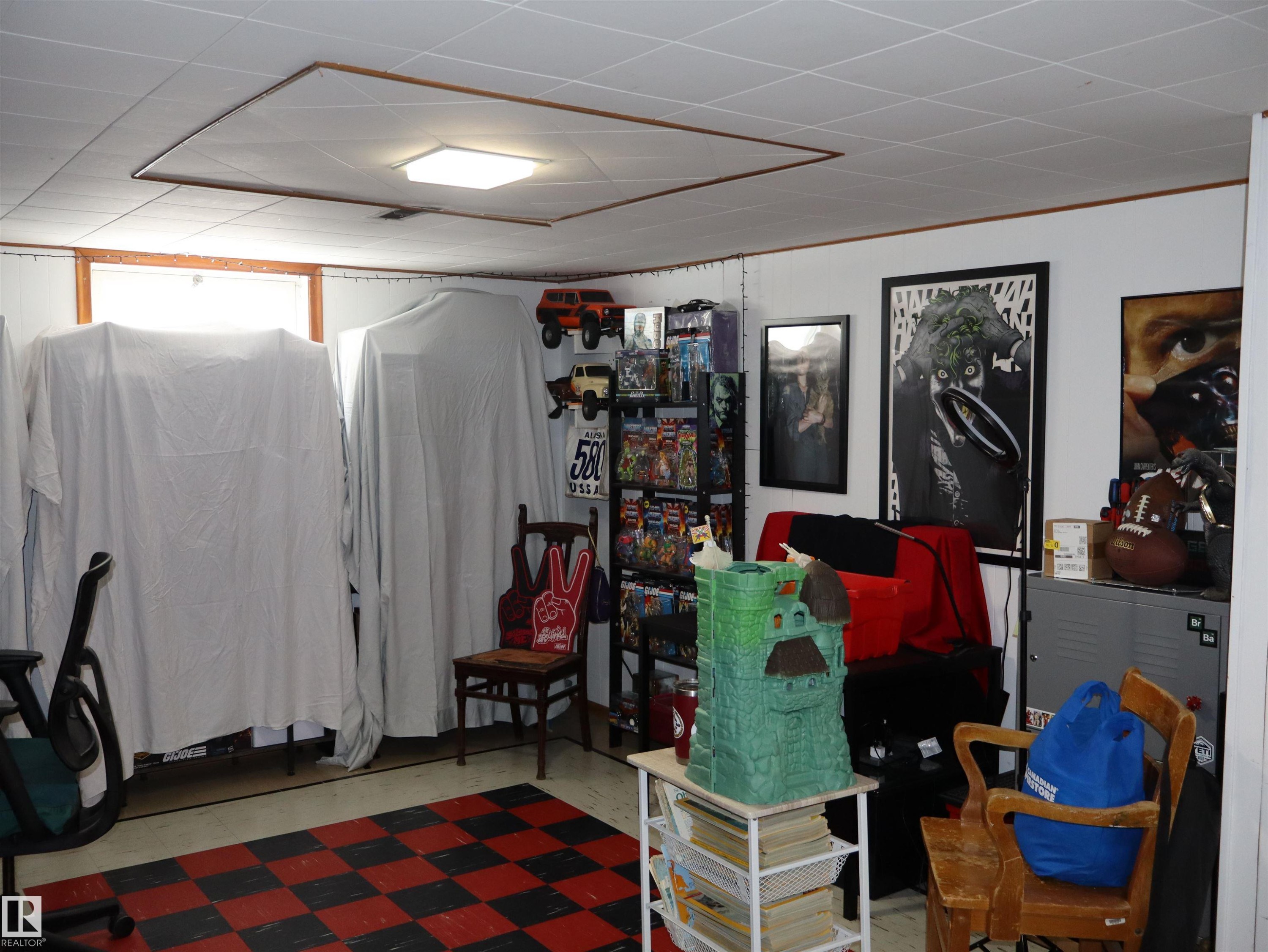 This room features a checkerboard floor and white walls - 4315 56 Avenue, Barrhead, AB - Indoor Photo Showing Other Room