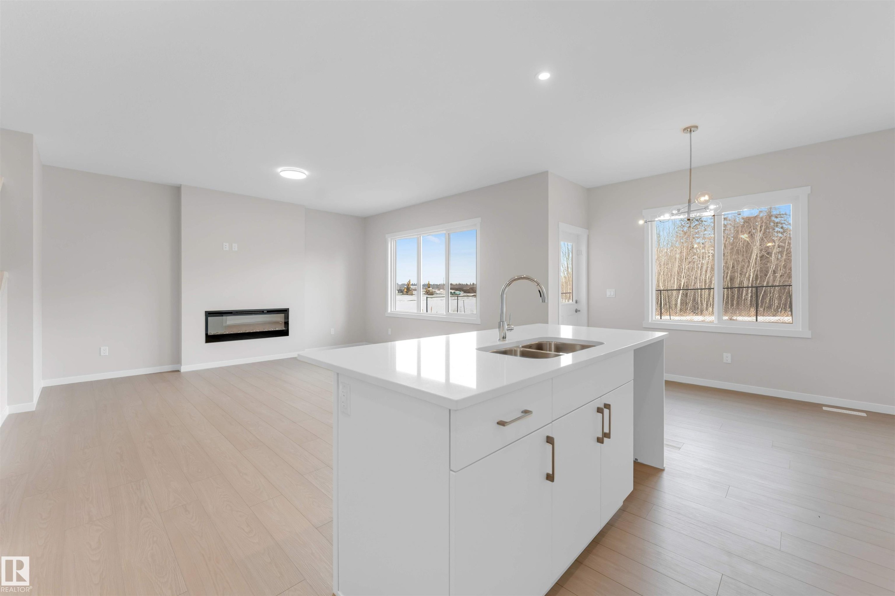 17839 7 St, Edmonton, AB - Indoor Photo Showing Kitchen With Fireplace With Double Sink