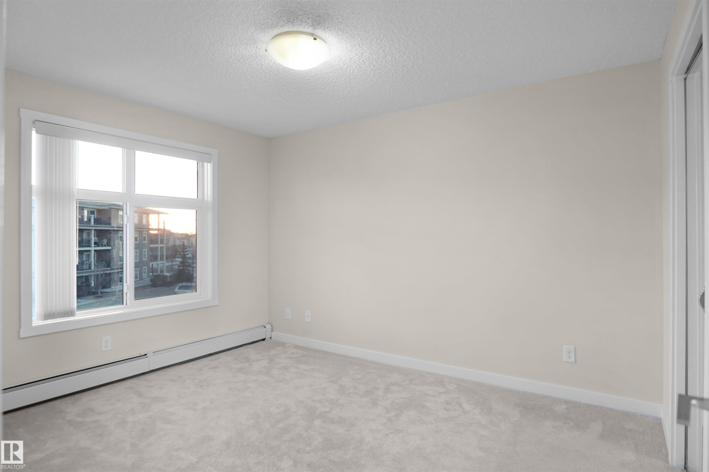 335 6076 Schonsee Way, Edmonton, AB - Indoor Photo Showing Other Room