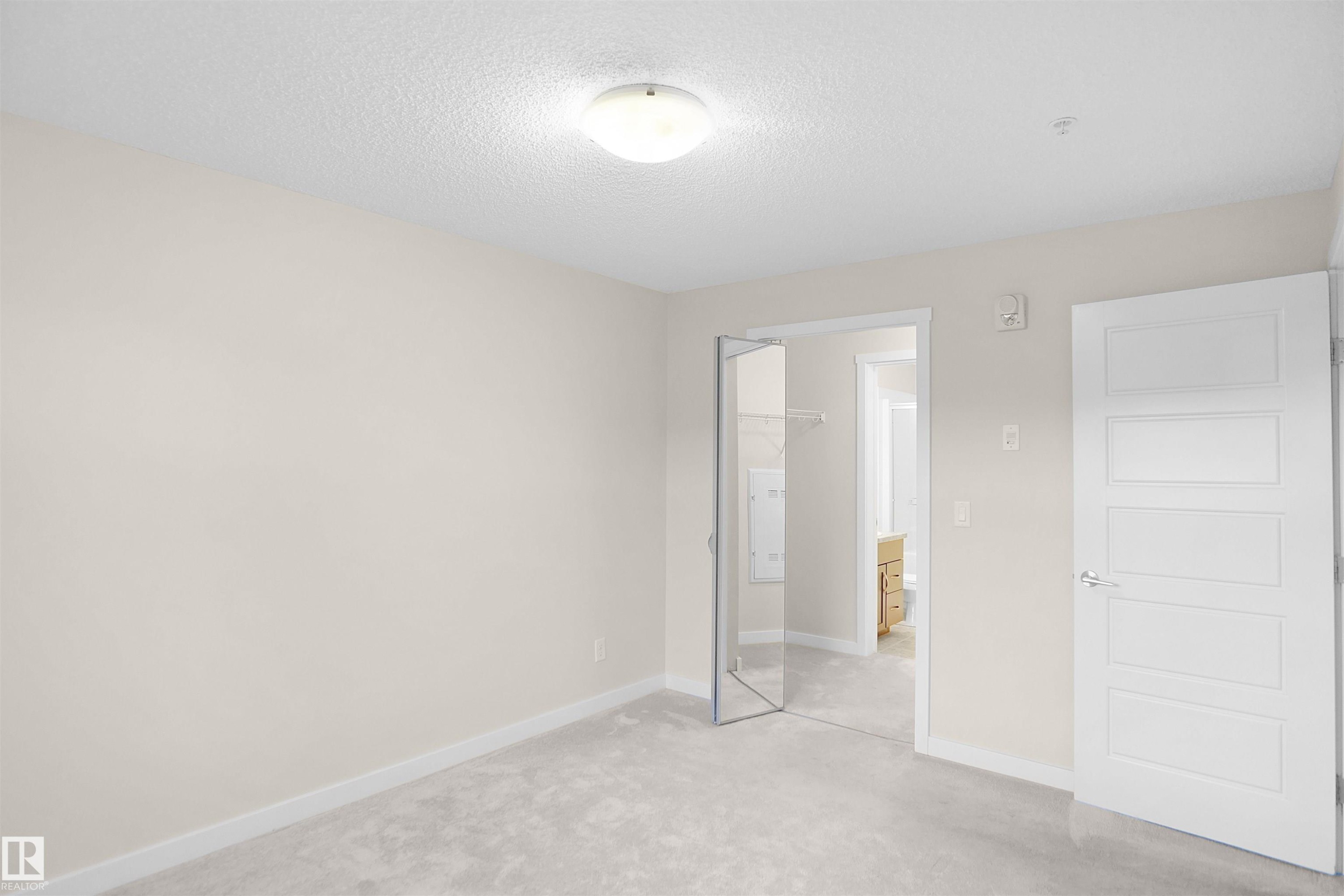 335 6076 Schonsee Way, Edmonton, AB - Indoor Photo Showing Other Room