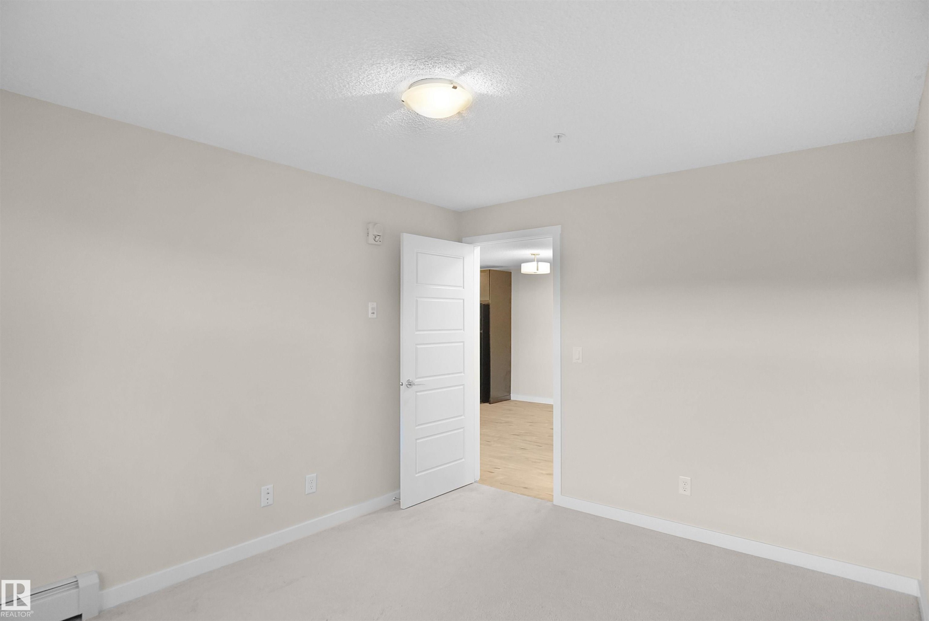 335 6076 Schonsee Way, Edmonton, AB - Indoor Photo Showing Other Room
