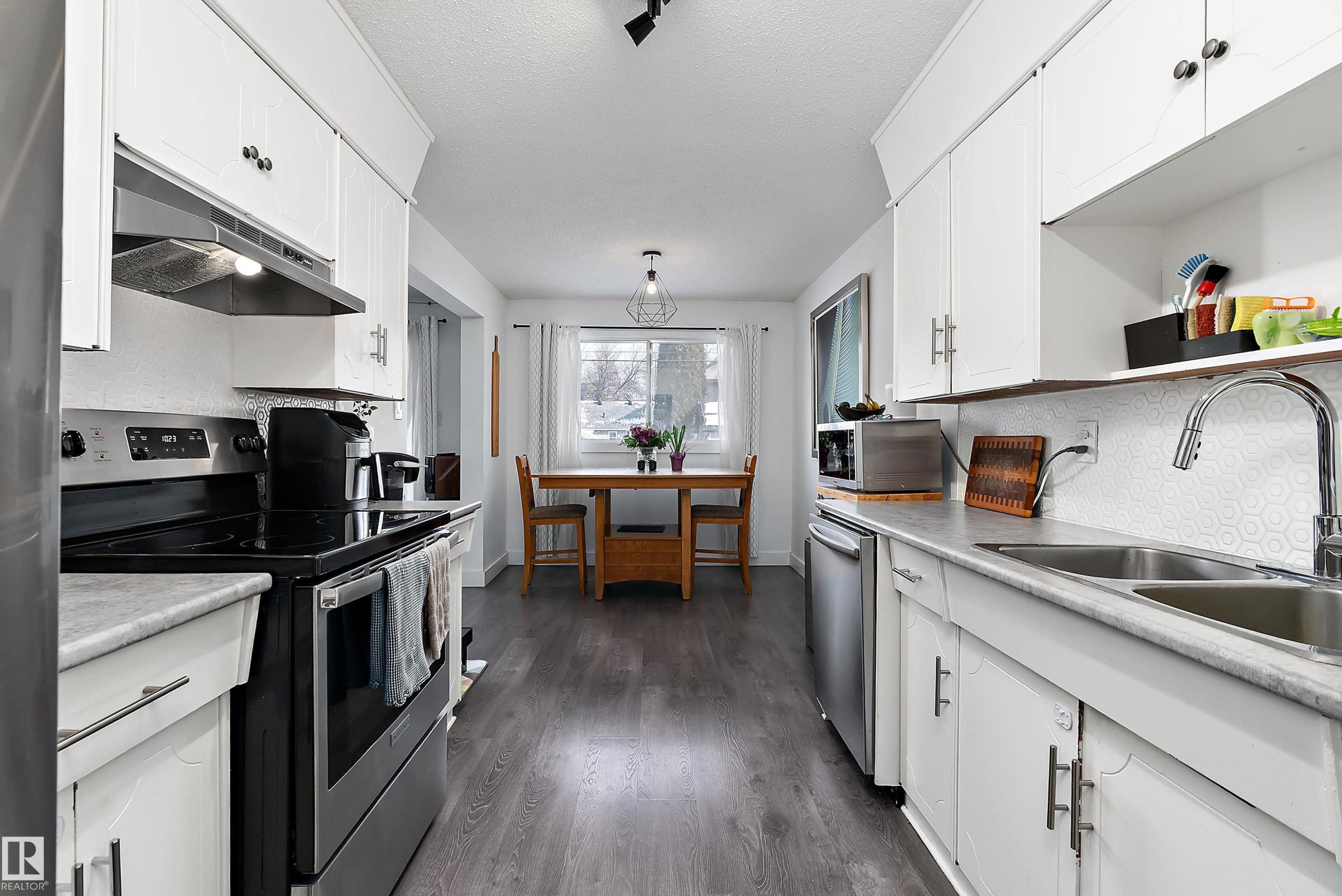 9326 80 Avenue, Edmonton, AB - Indoor Photo Showing Kitchen With Double Sink