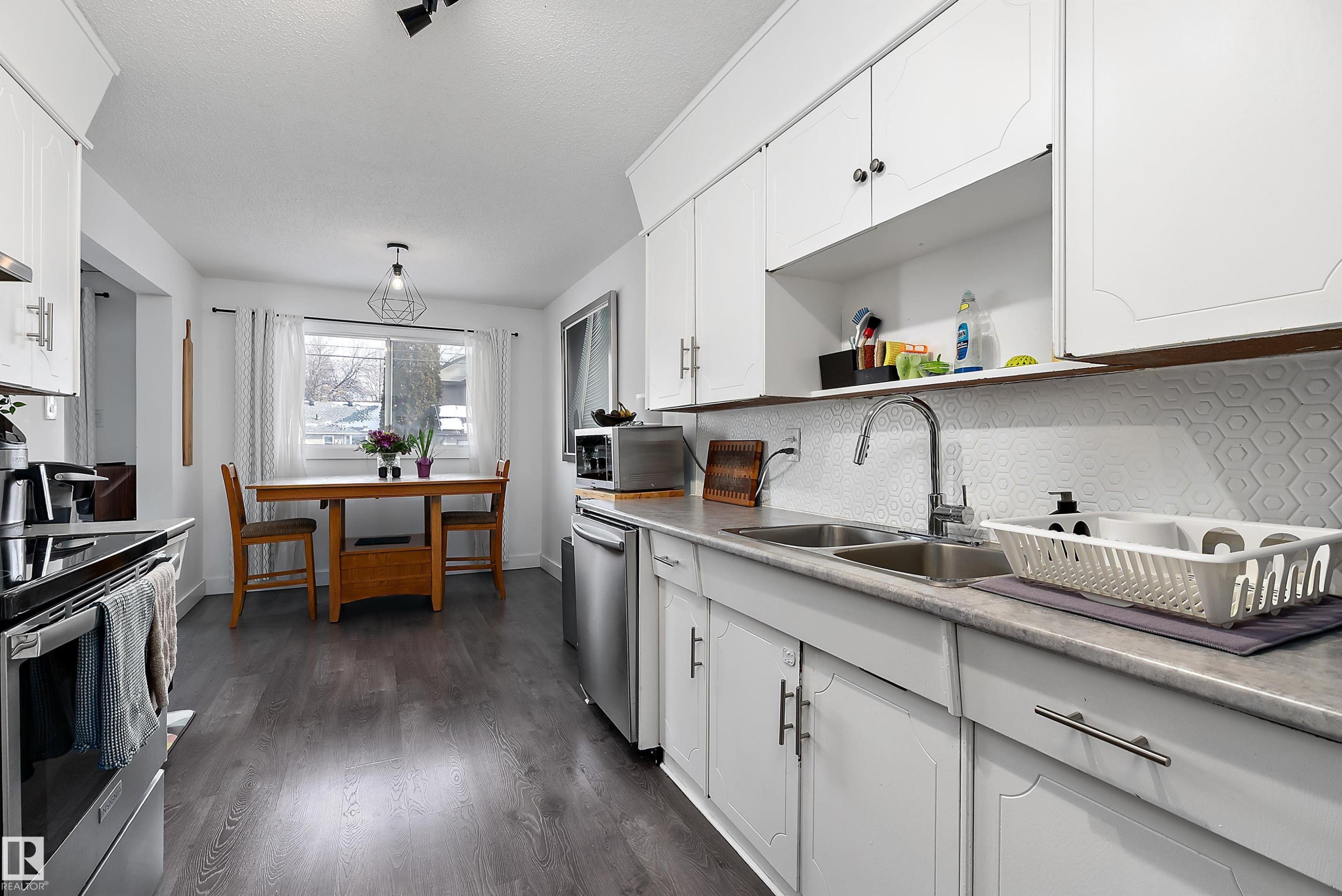9326 80 Avenue, Edmonton, AB - Indoor Photo Showing Kitchen With Double Sink