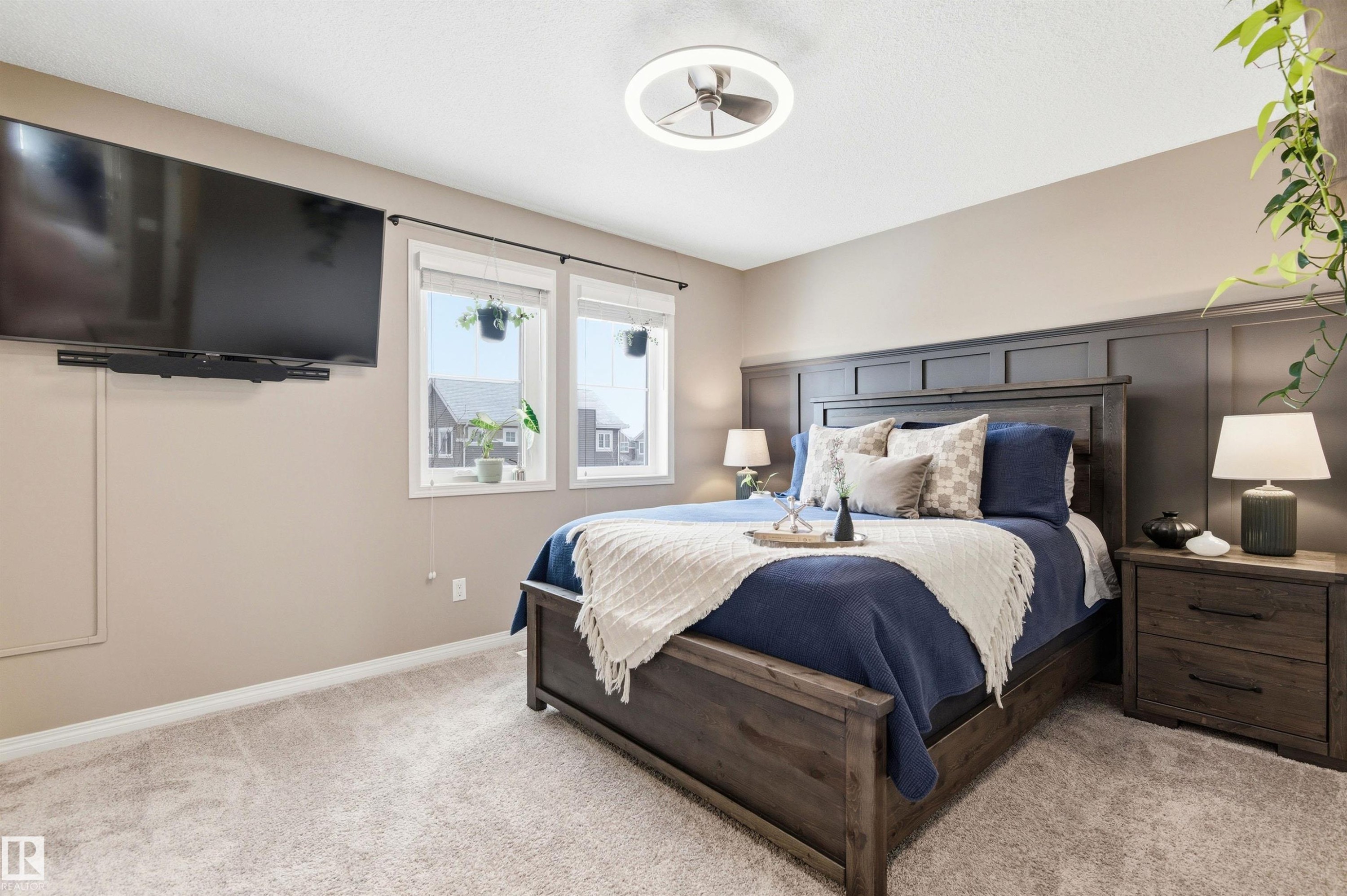 The room features carpeted flooring and neutral wall colors - 3247 Cherry Crescent, Edmonton, AB - Indoor Photo Showing Bedroom
