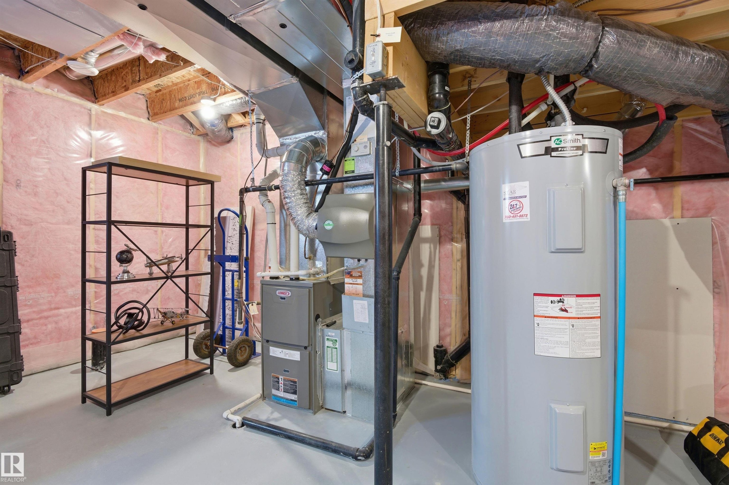 The property includes a water heater and furnace, providing essential utilities - 3247 Cherry Crescent, Edmonton, AB - Indoor Photo Showing Basement