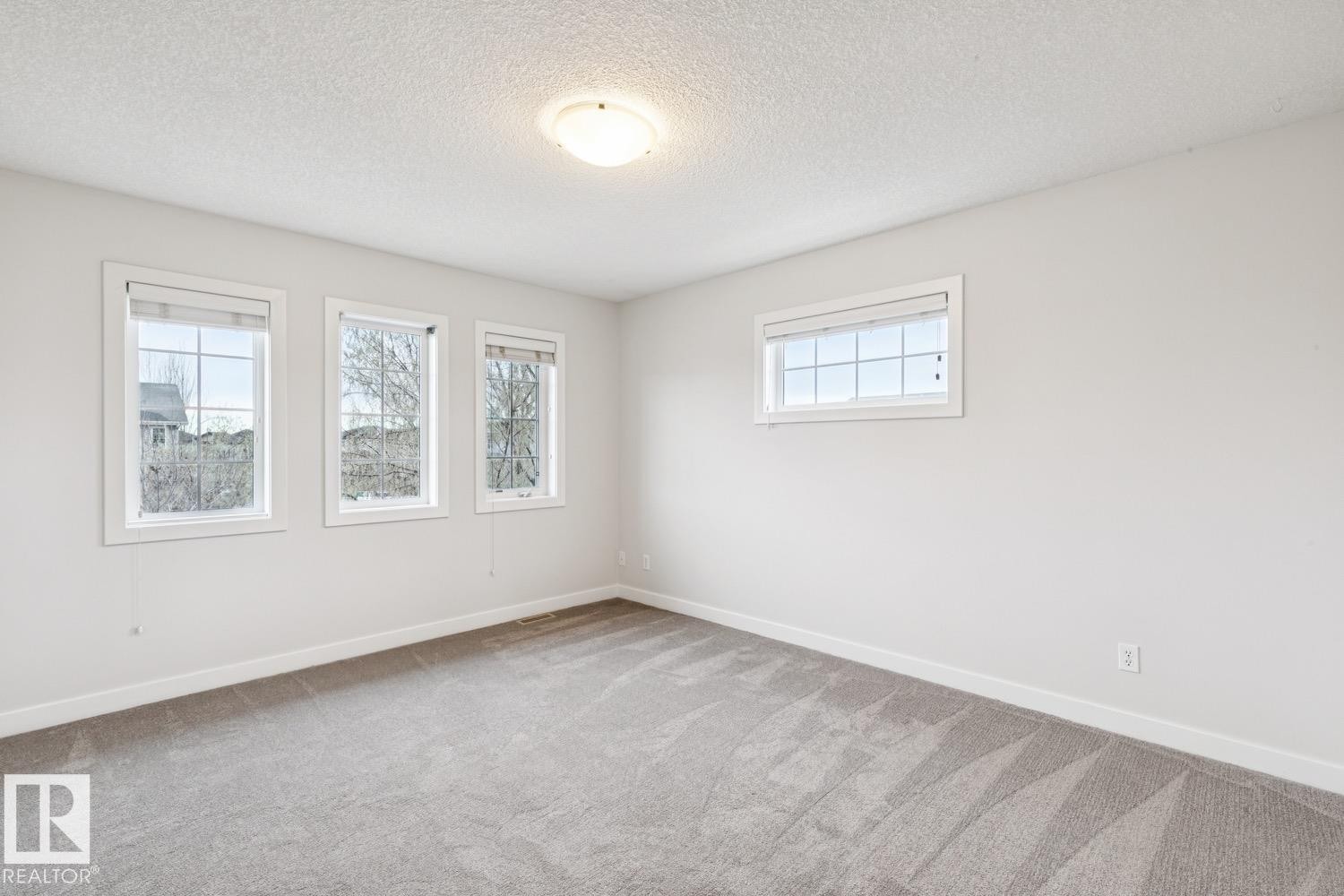 323 Avena Link, Leduc, AB - Indoor Photo Showing Other Room