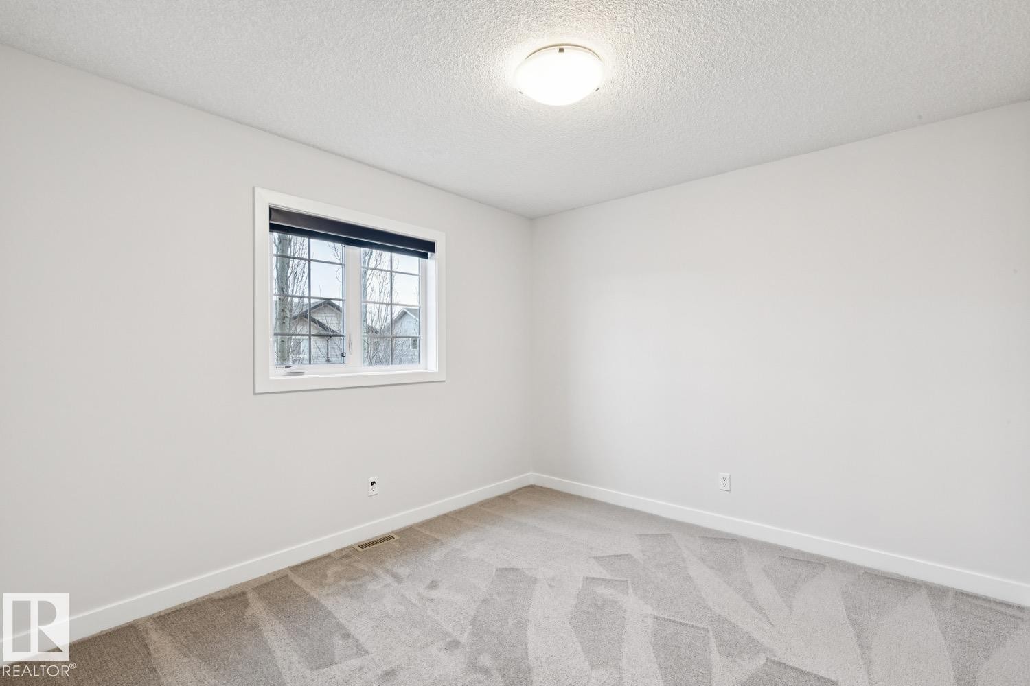323 Avena Link, Leduc, AB - Indoor Photo Showing Other Room
