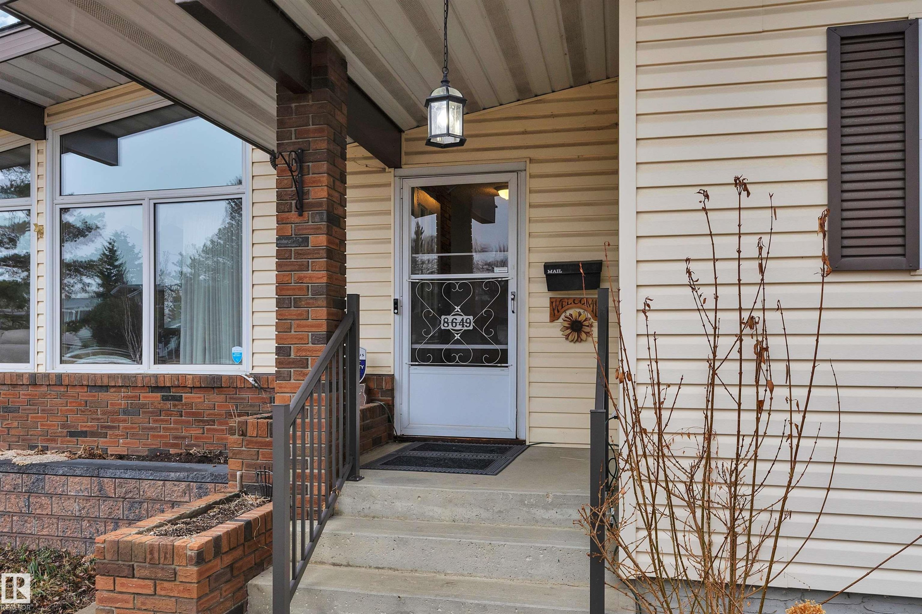 Two new handrails installed recently! - 8649 27 Avenue, Edmonton, AB - Outdoor With Exterior