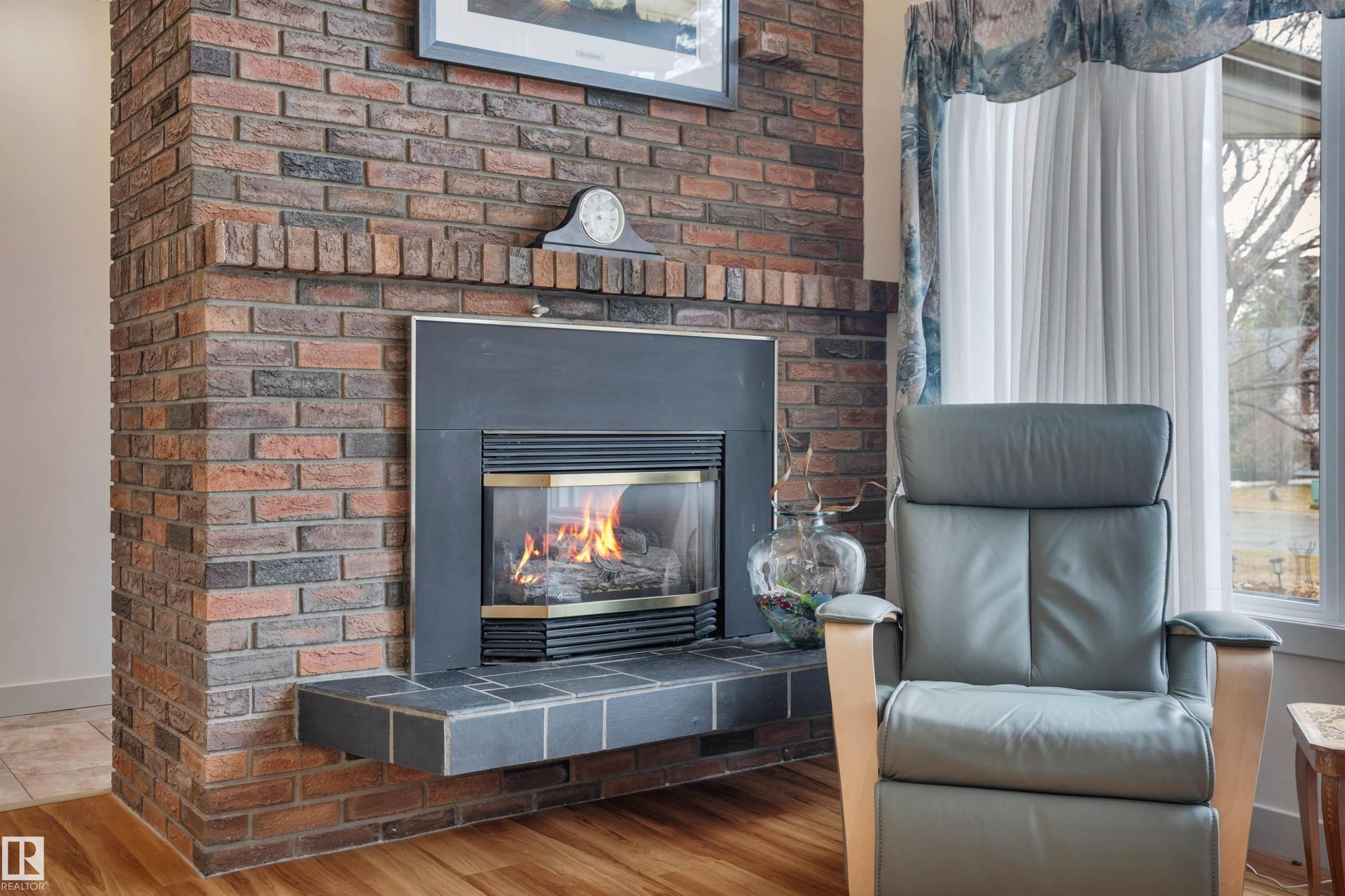 8649 27 Avenue, Edmonton, AB - Indoor Photo Showing Living Room With Fireplace