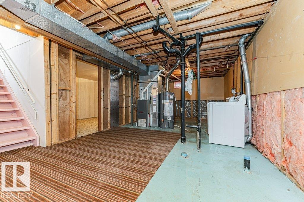 The property features a utility area with exposed ceiling joists, ductwork, and plumbing - 8804 19 Avenue, Edmonton, AB - Indoor Photo Showing Basement