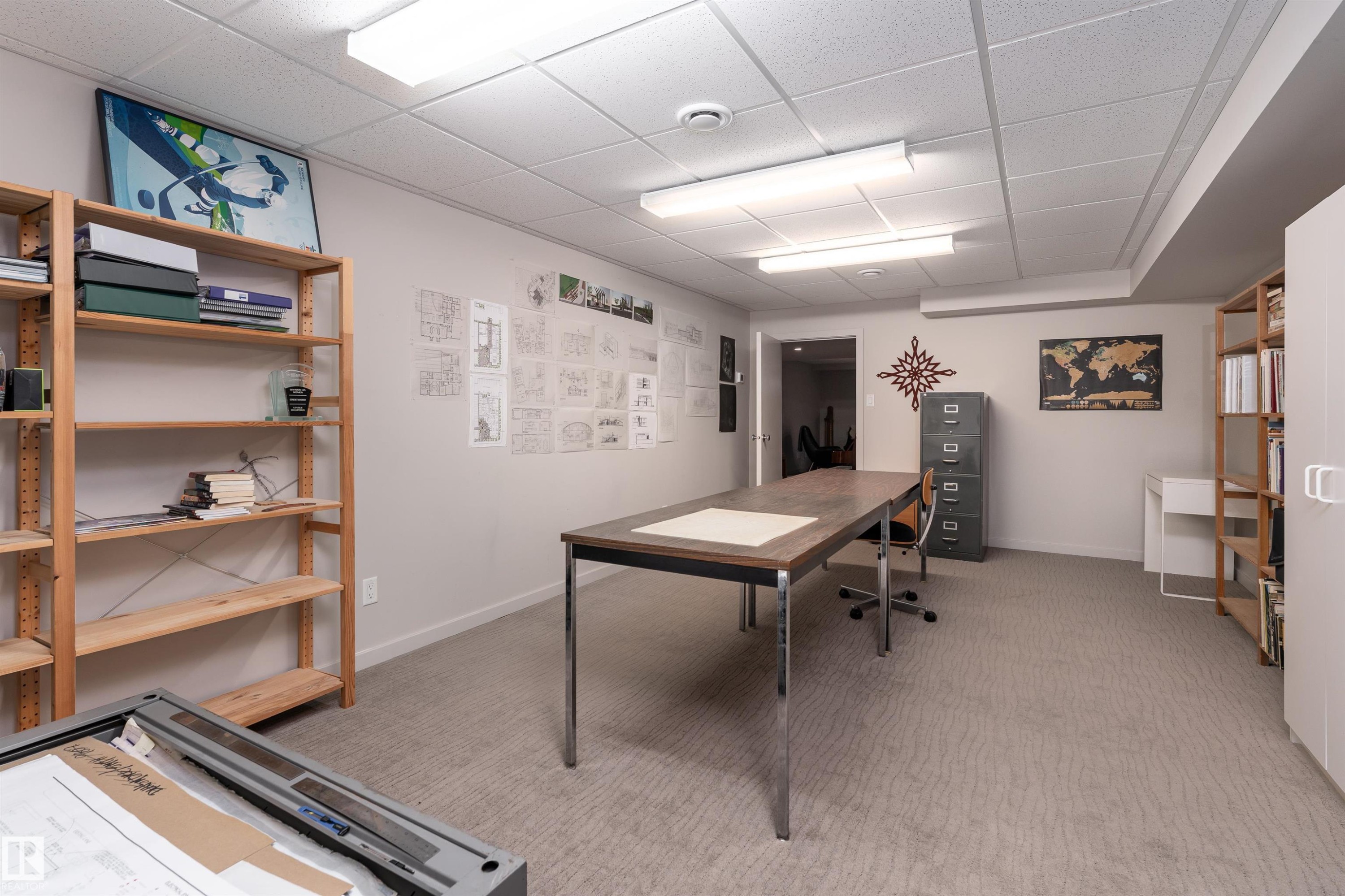 Spacious room featuring carpeting, recessed lighting, and built-in shelving - 9715 141 Street Nw, Edmonton, AB - Indoor