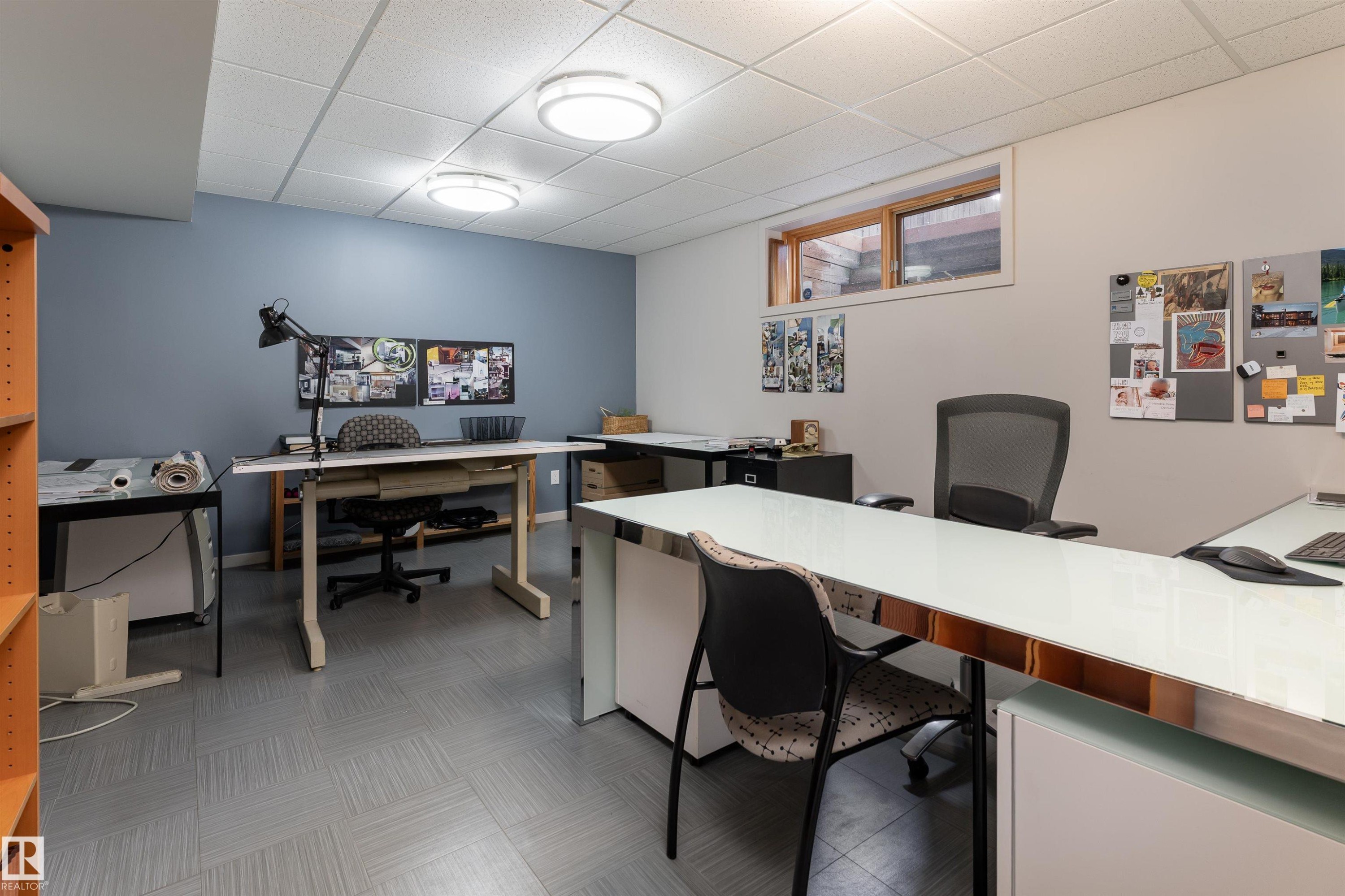 The property features a versatile room with a drop ceiling, recessed lighting, and grey flooring - 9715 141 Street Nw, Edmonton, AB - Indoor Photo Showing Office