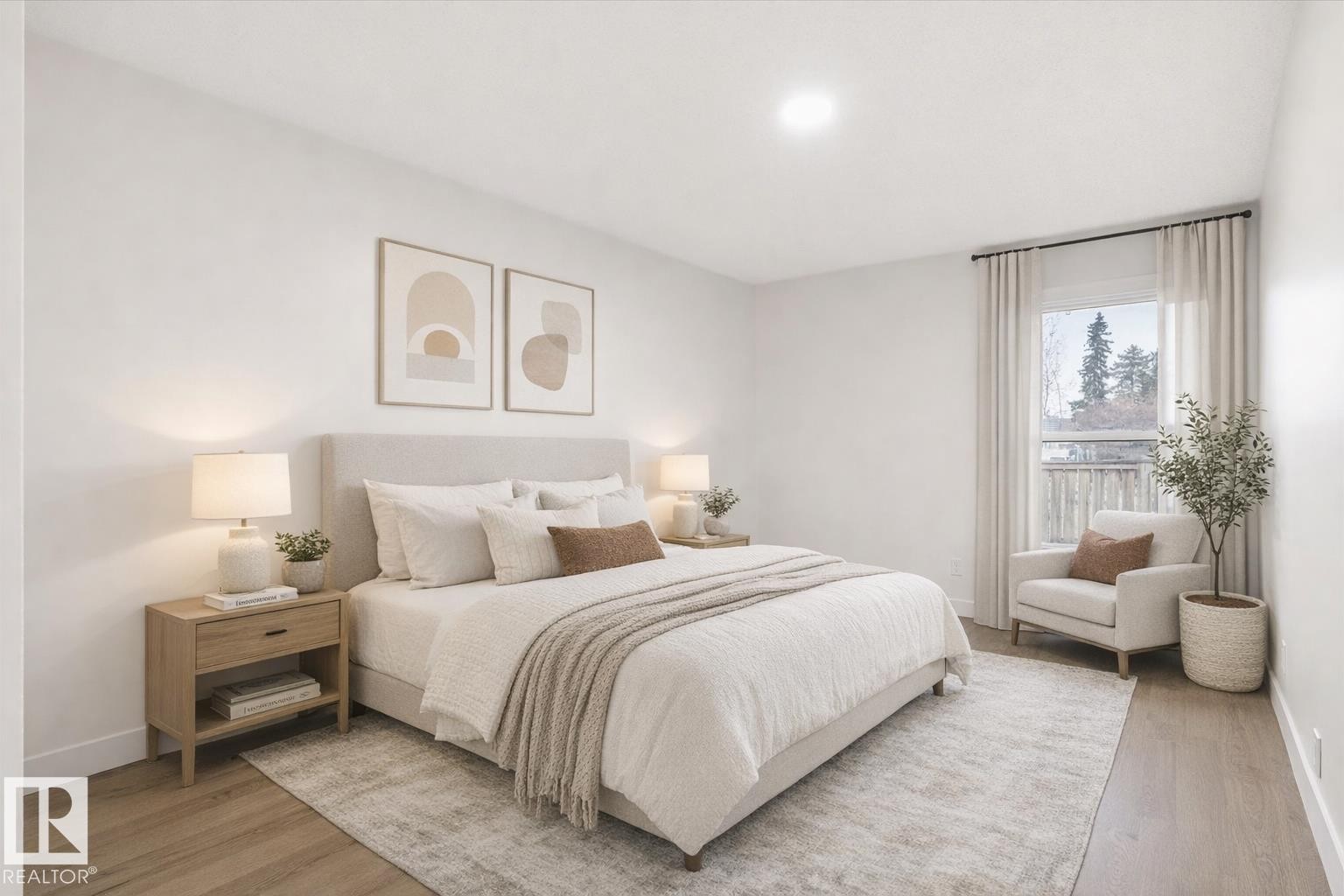 The bedroom features light-colored walls and flooring, with a window offering views of greenery and a fence - 6540 184 Street, Edmonton, AB - Indoor Photo Showing Bedroom