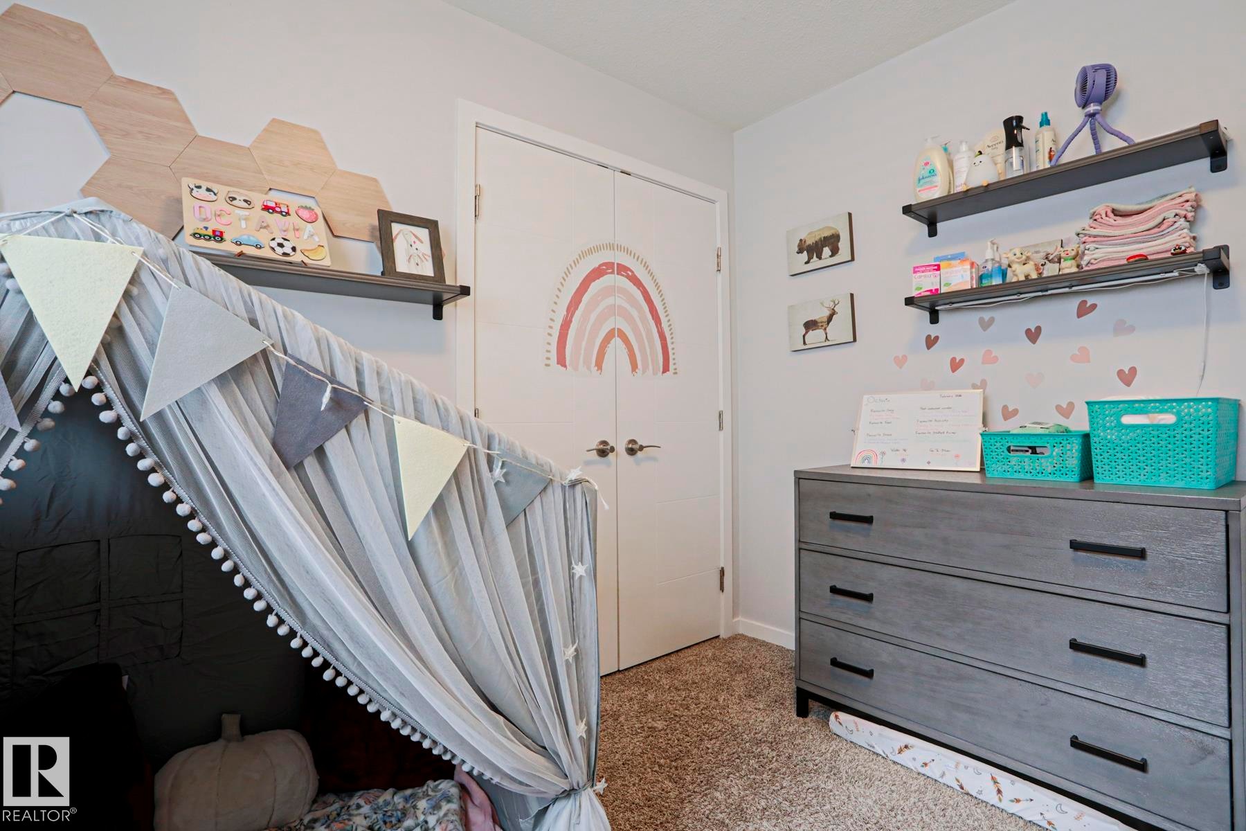 This room features light-colored walls and soft carpeting - 18 Enchanted Way, St. Albert, AB