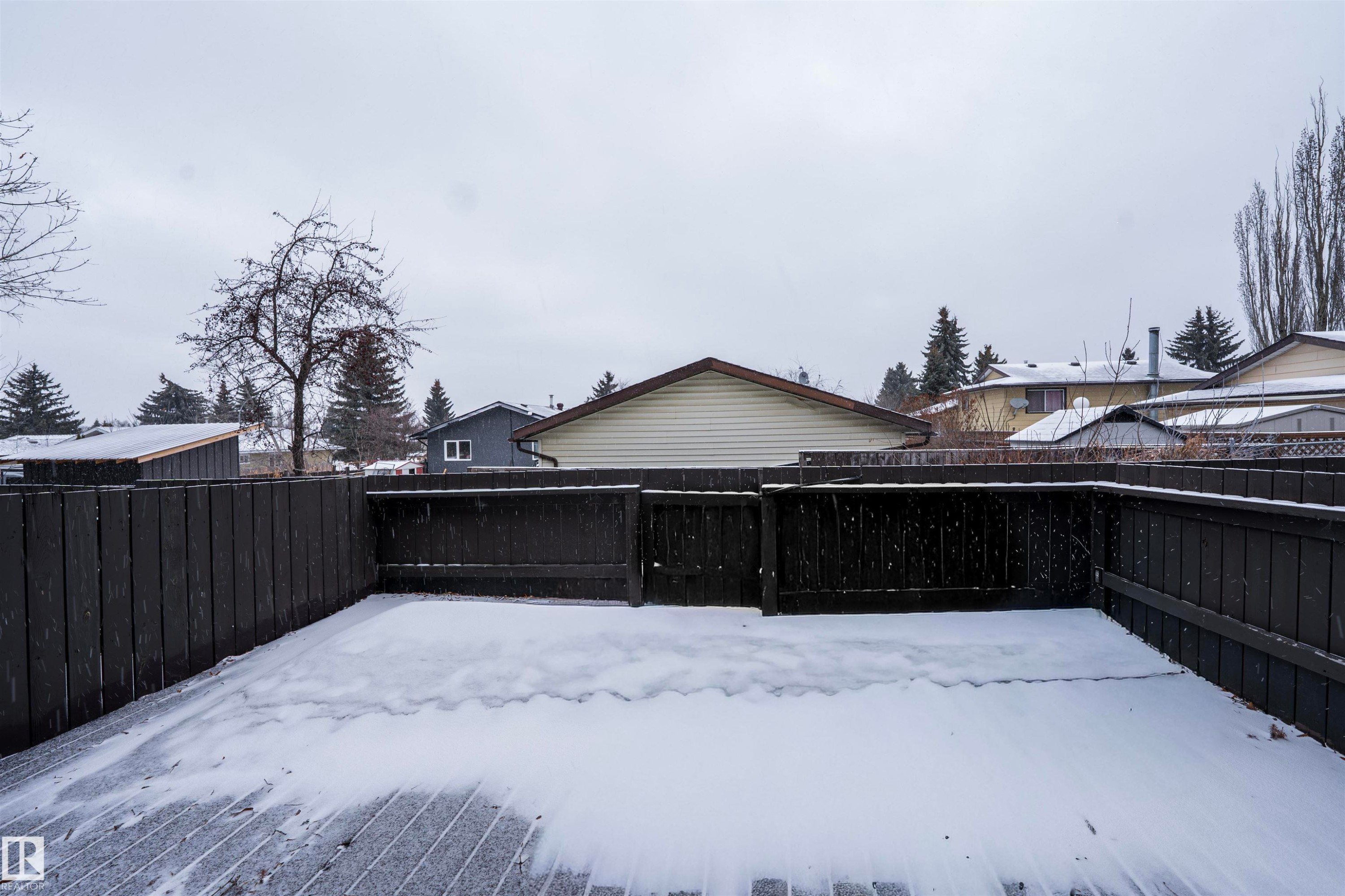 The property features a private fenced deck - 1728 37 Street, Edmonton, AB - Outdoor