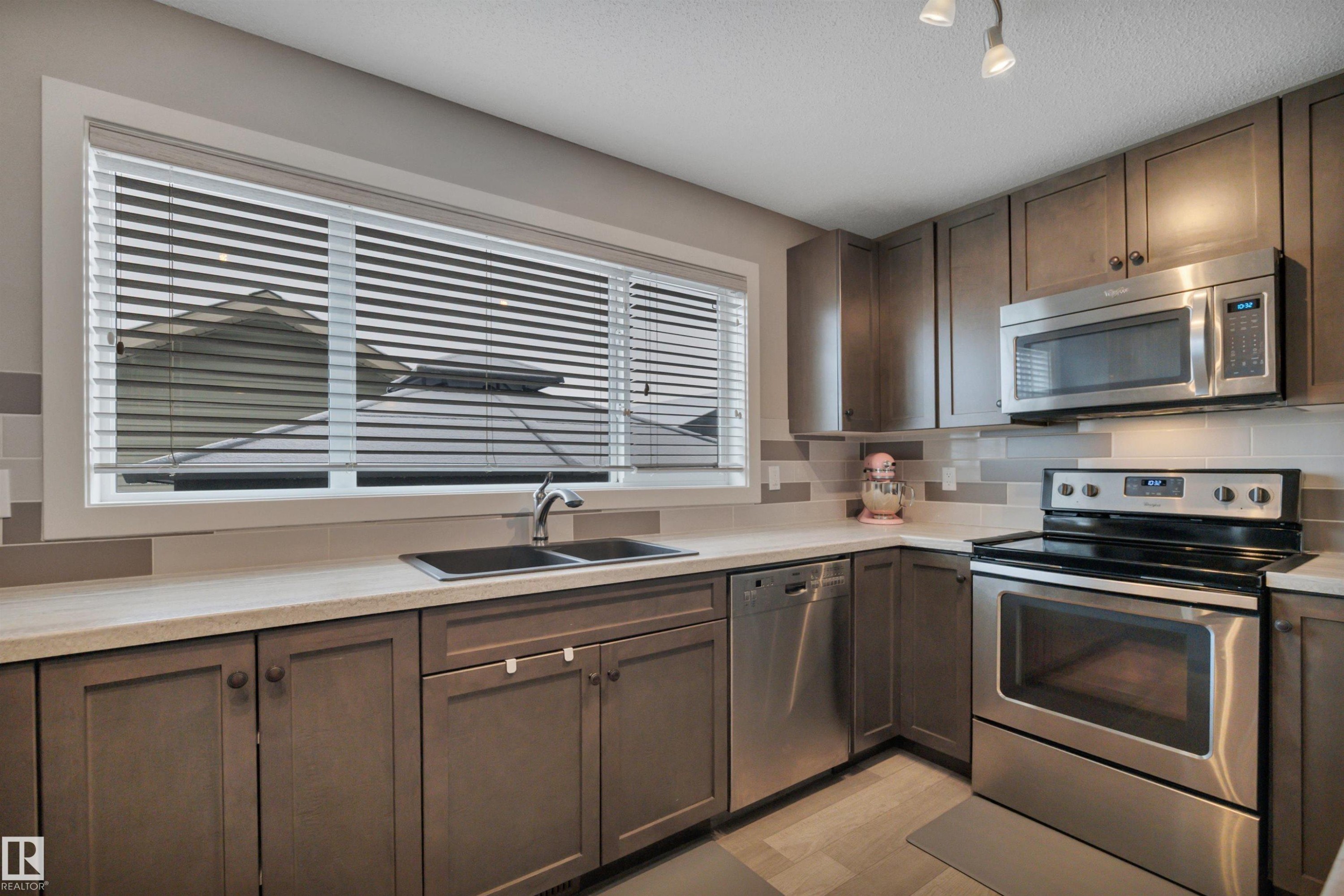 17626 61A Street, Edmonton, AB - Indoor Photo Showing Kitchen With Double Sink