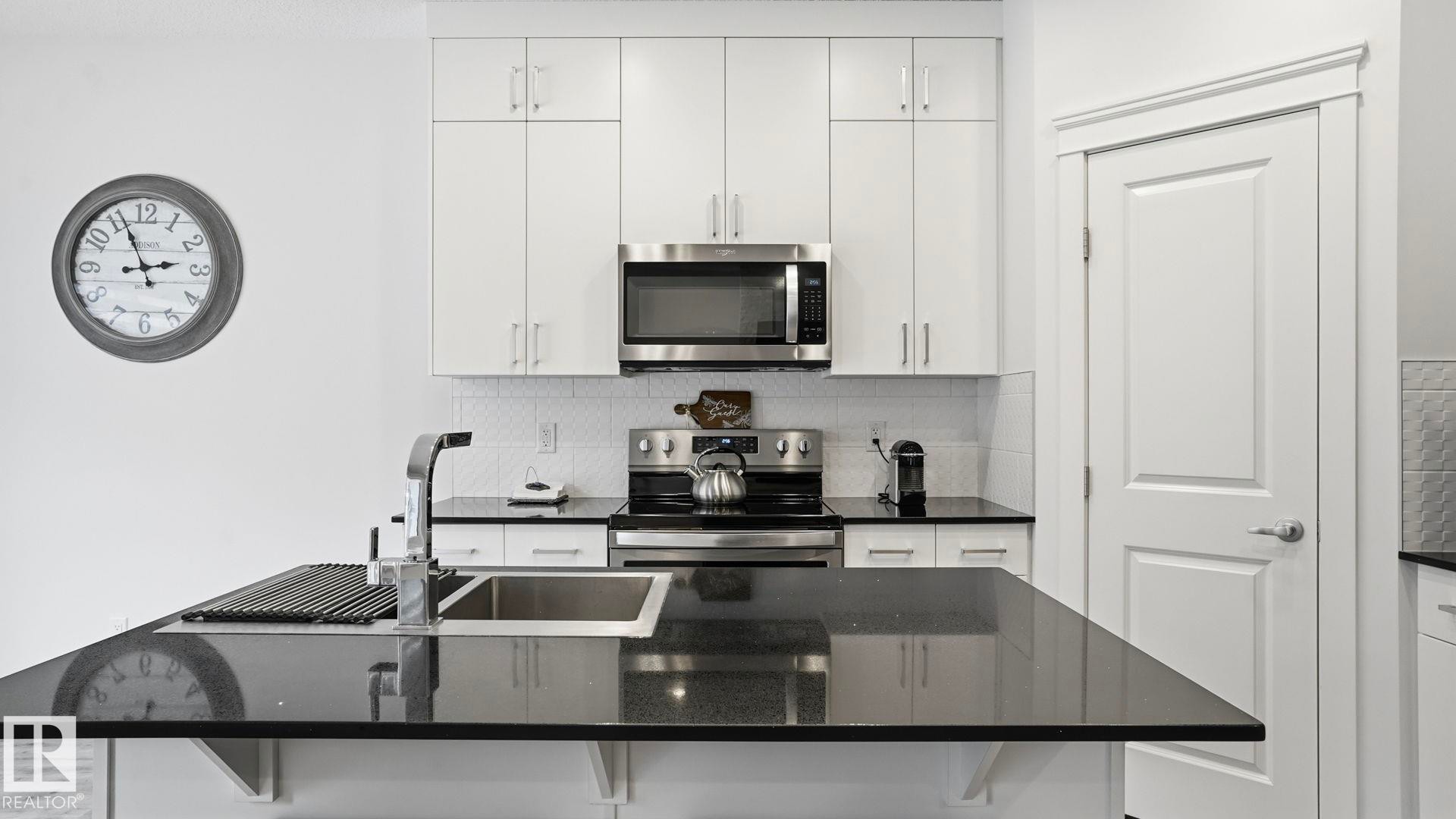 4112 171 Avenue, Edmonton, AB - Indoor Photo Showing Kitchen With Double Sink With Upgraded Kitchen